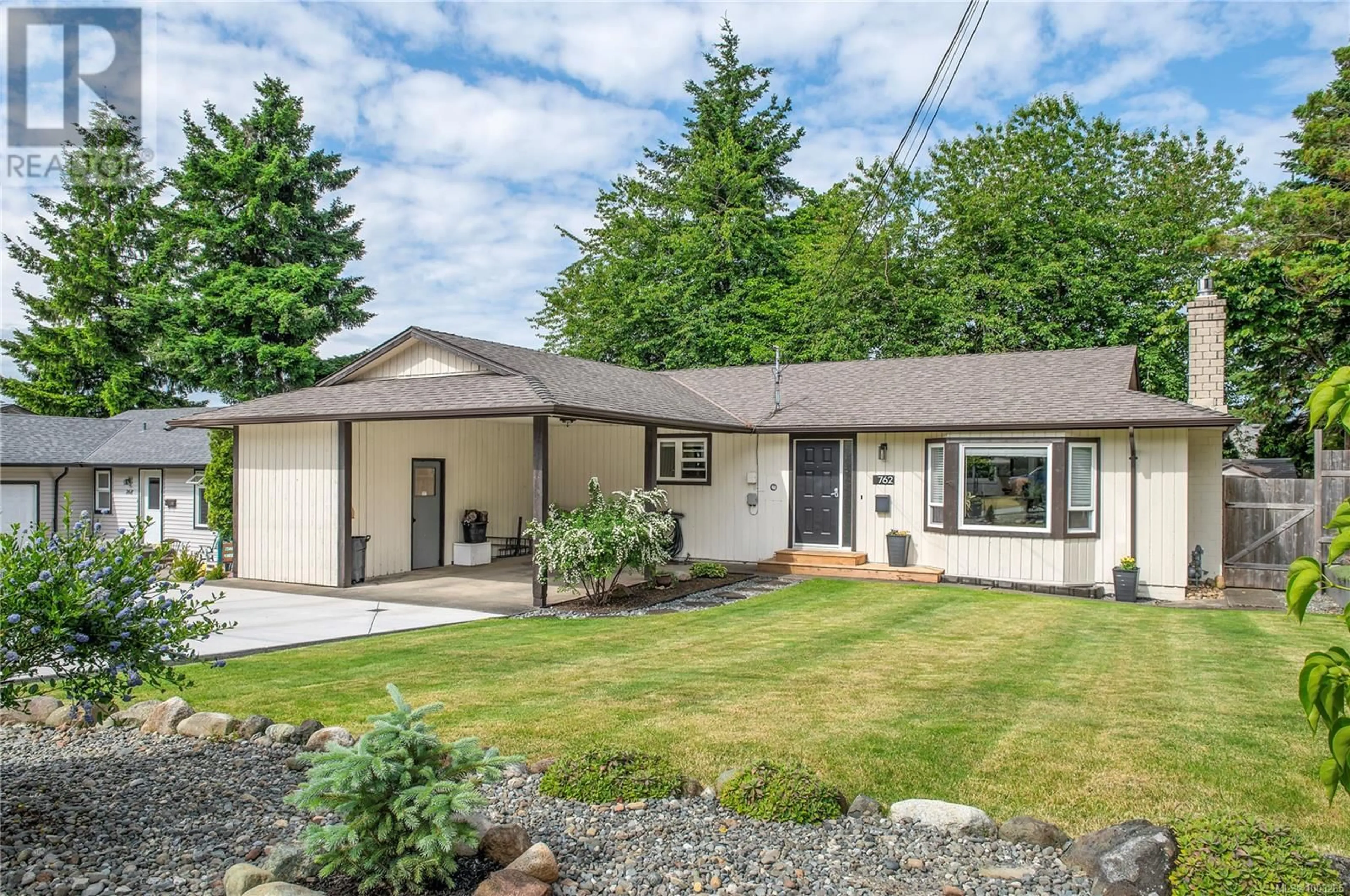 Home with vinyl exterior material, street for 762 CHRISTOPHER ROAD, Campbell River British Columbia V9W5Z9
