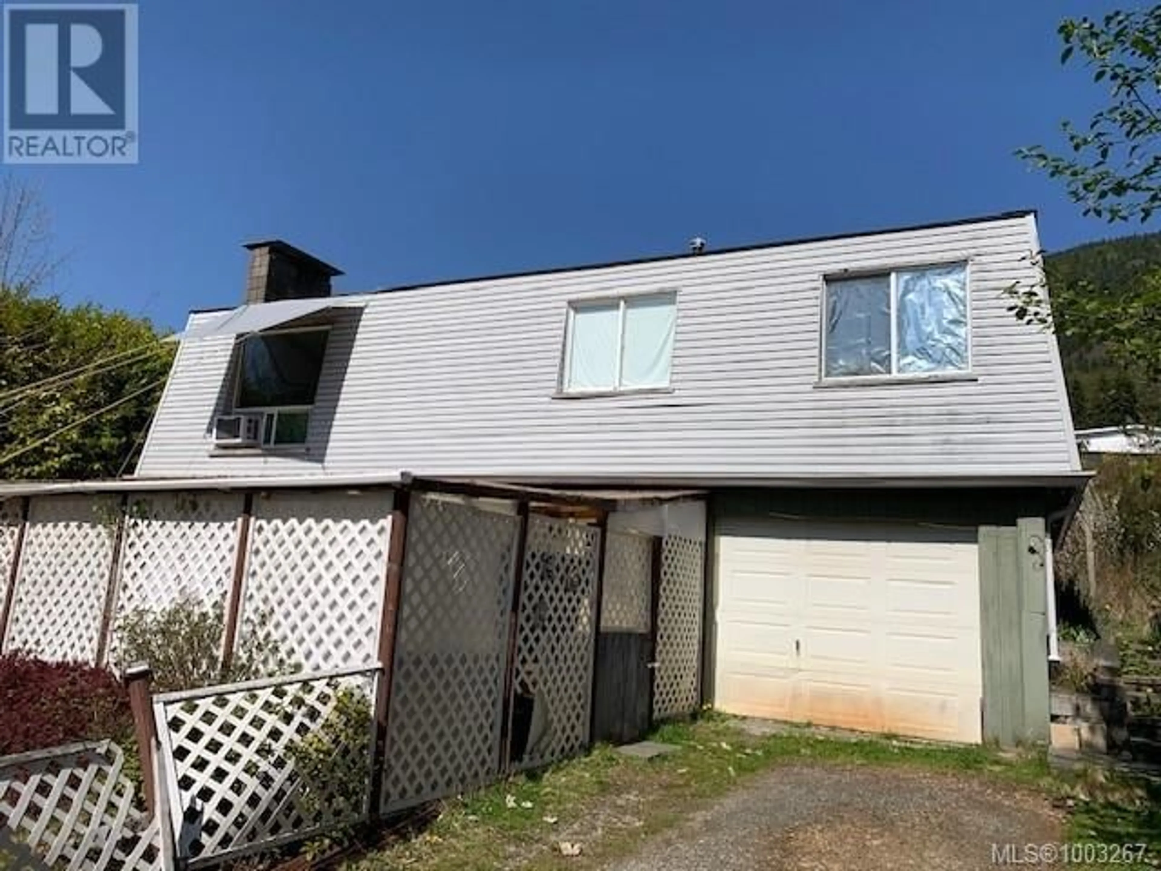 A pic from outside/outdoor area/front of a property/back of a property/a pic from drone, building for 1203 MAQUINNA AVENUE, Port Alice British Columbia V0N2N0