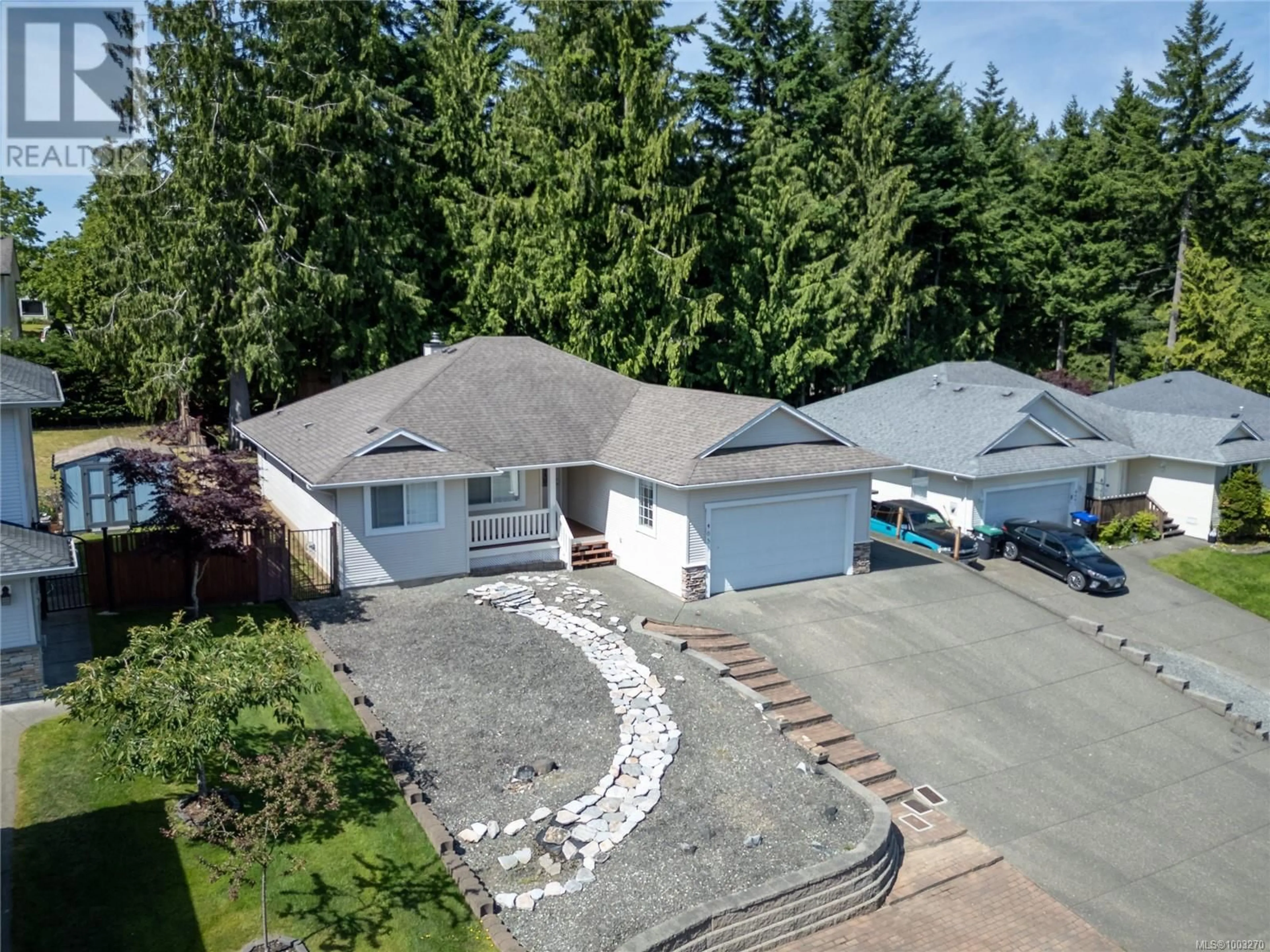 A pic from outside/outdoor area/front of a property/back of a property/a pic from drone, street for 4651 SALAL PLACE, Courtenay British Columbia V9N4A1
