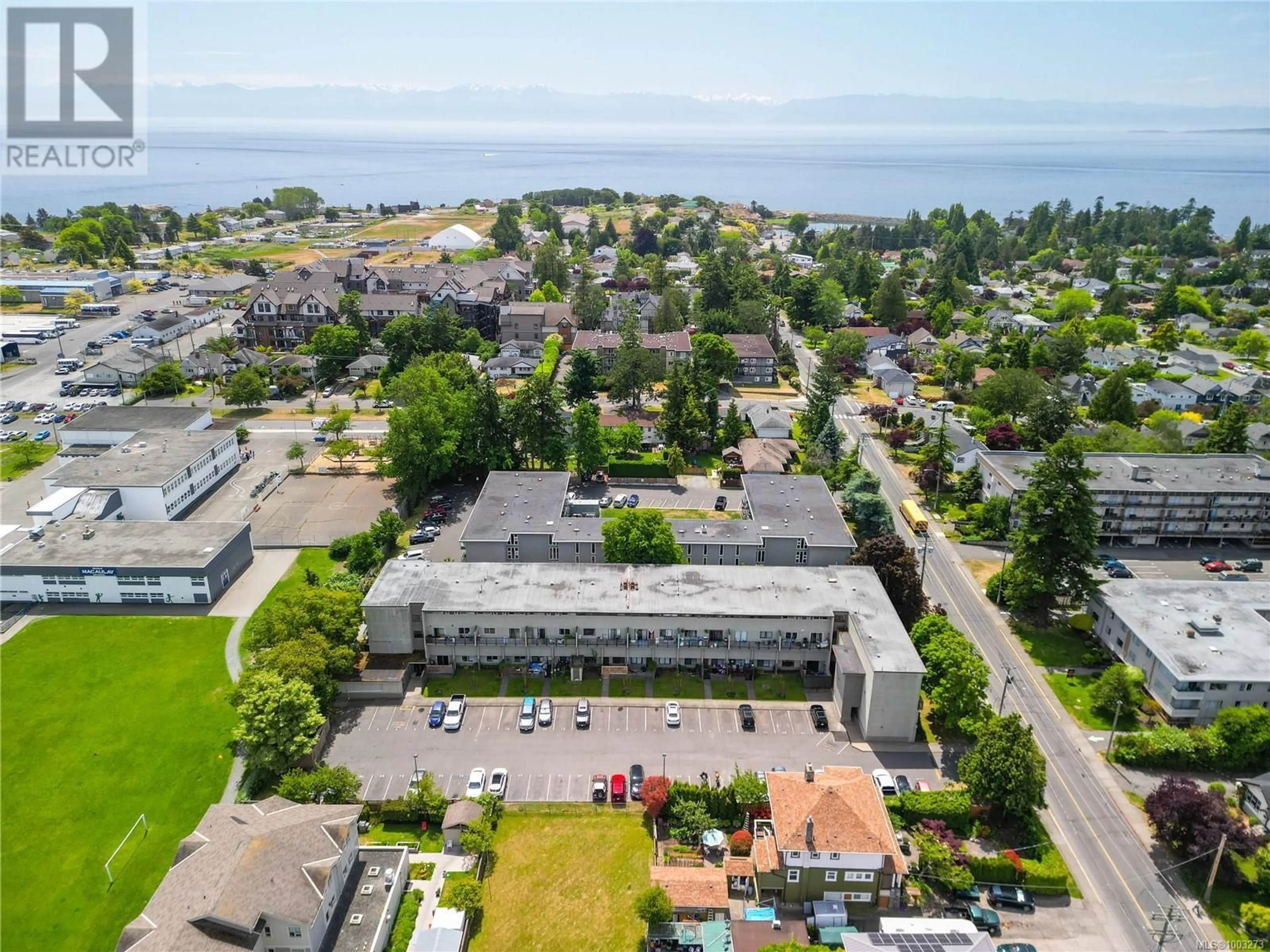 A pic from outside/outdoor area/front of a property/back of a property/a pic from drone, unknown for 12 - 477 LAMPSON STREET, Esquimalt British Columbia V9A5Z4