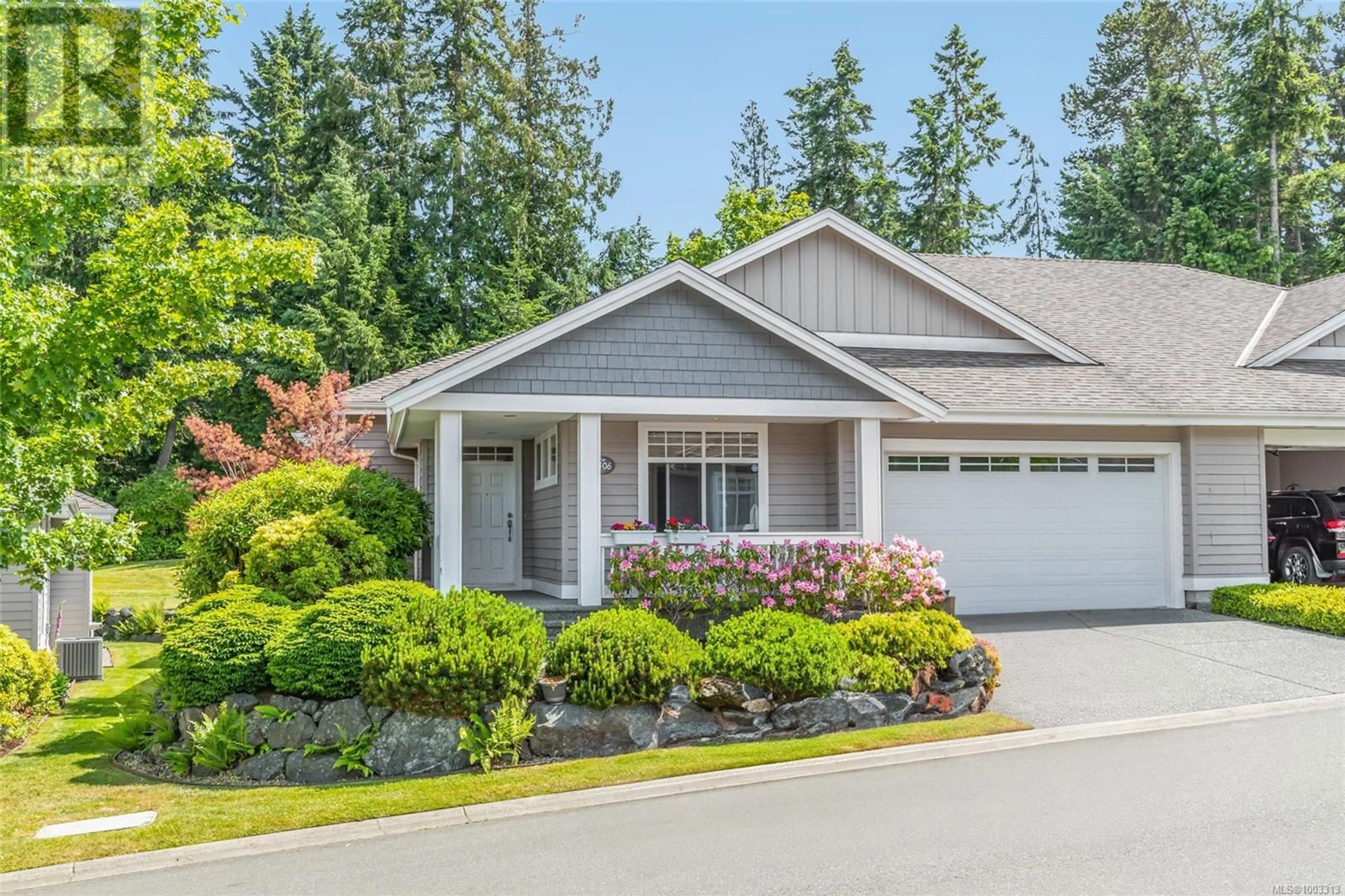 Home with vinyl exterior material, street for 1406 CAPE COD DRIVE, Parksville British Columbia V9P2Y4