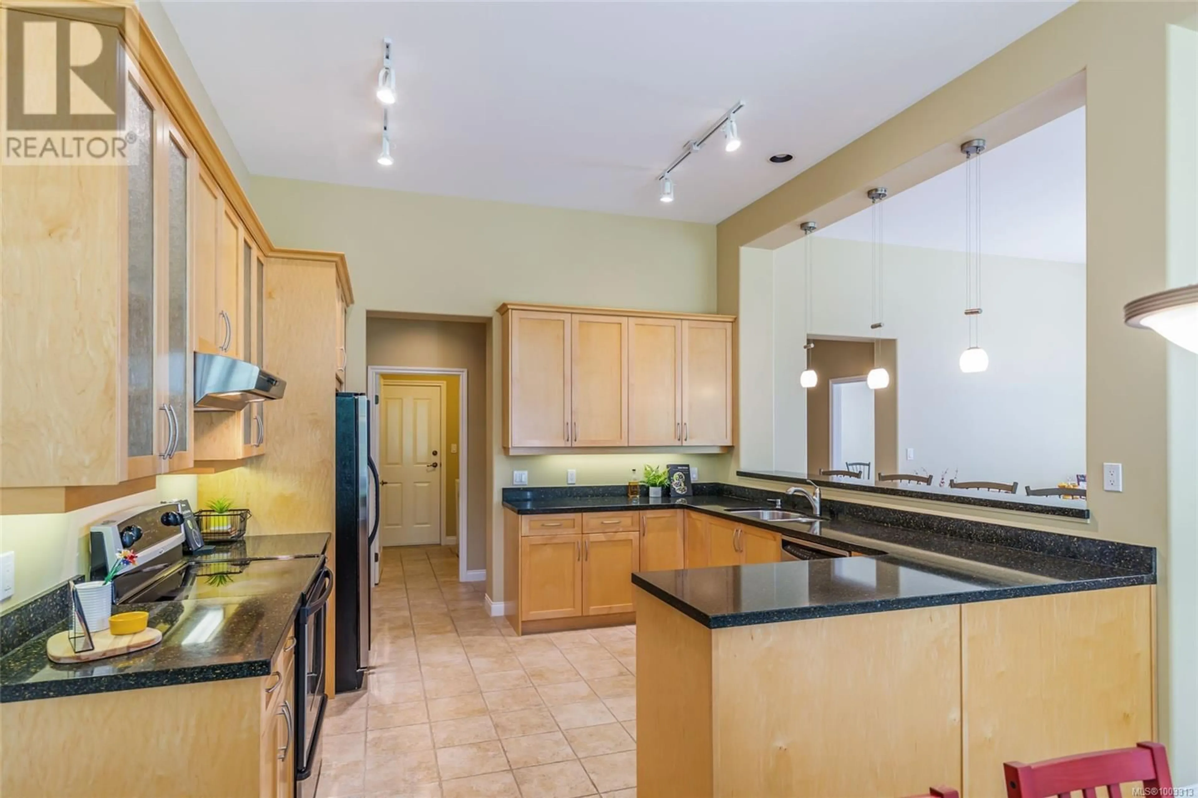 Open concept kitchen, ceramic/tile floor for 1406 CAPE COD DRIVE, Parksville British Columbia V9P2Y4