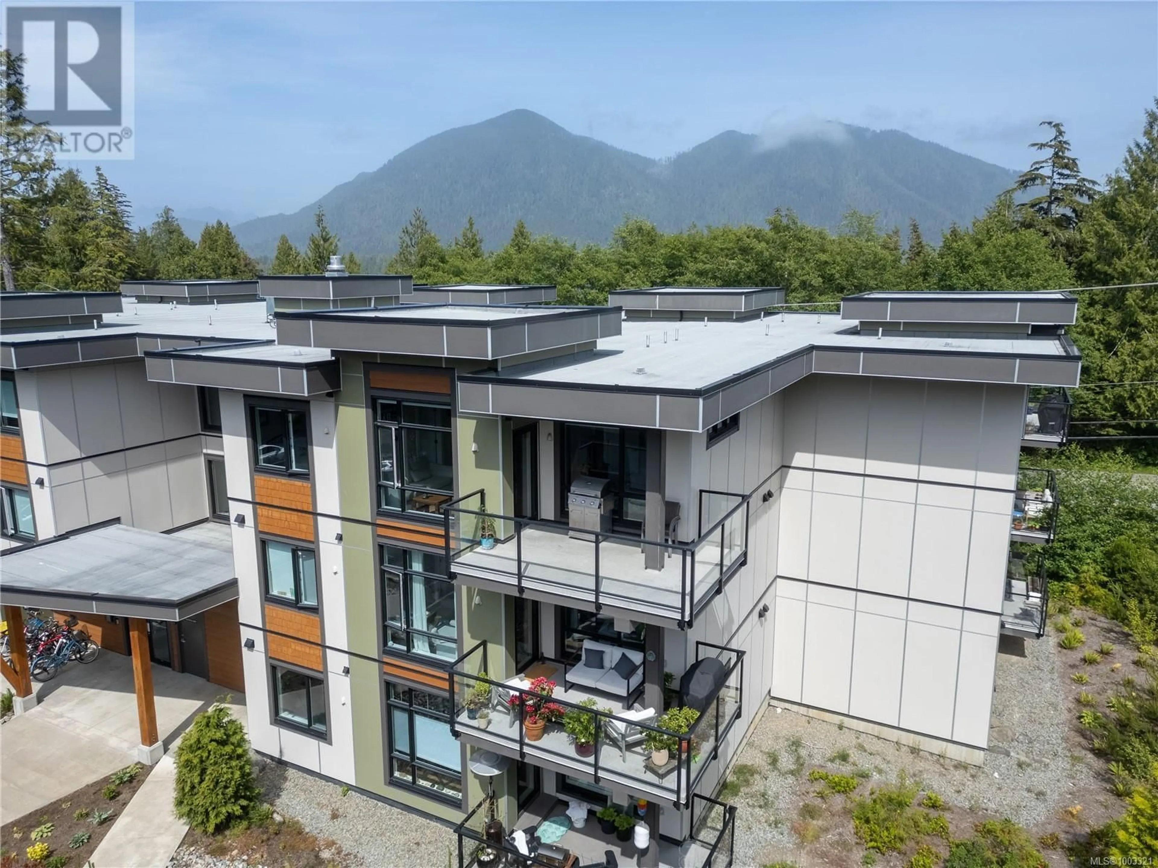 A pic from outside/outdoor area/front of a property/back of a property/a pic from drone, mountain view for 301 - 700 YEW WOOD ROAD, Tofino British Columbia V0R3A0