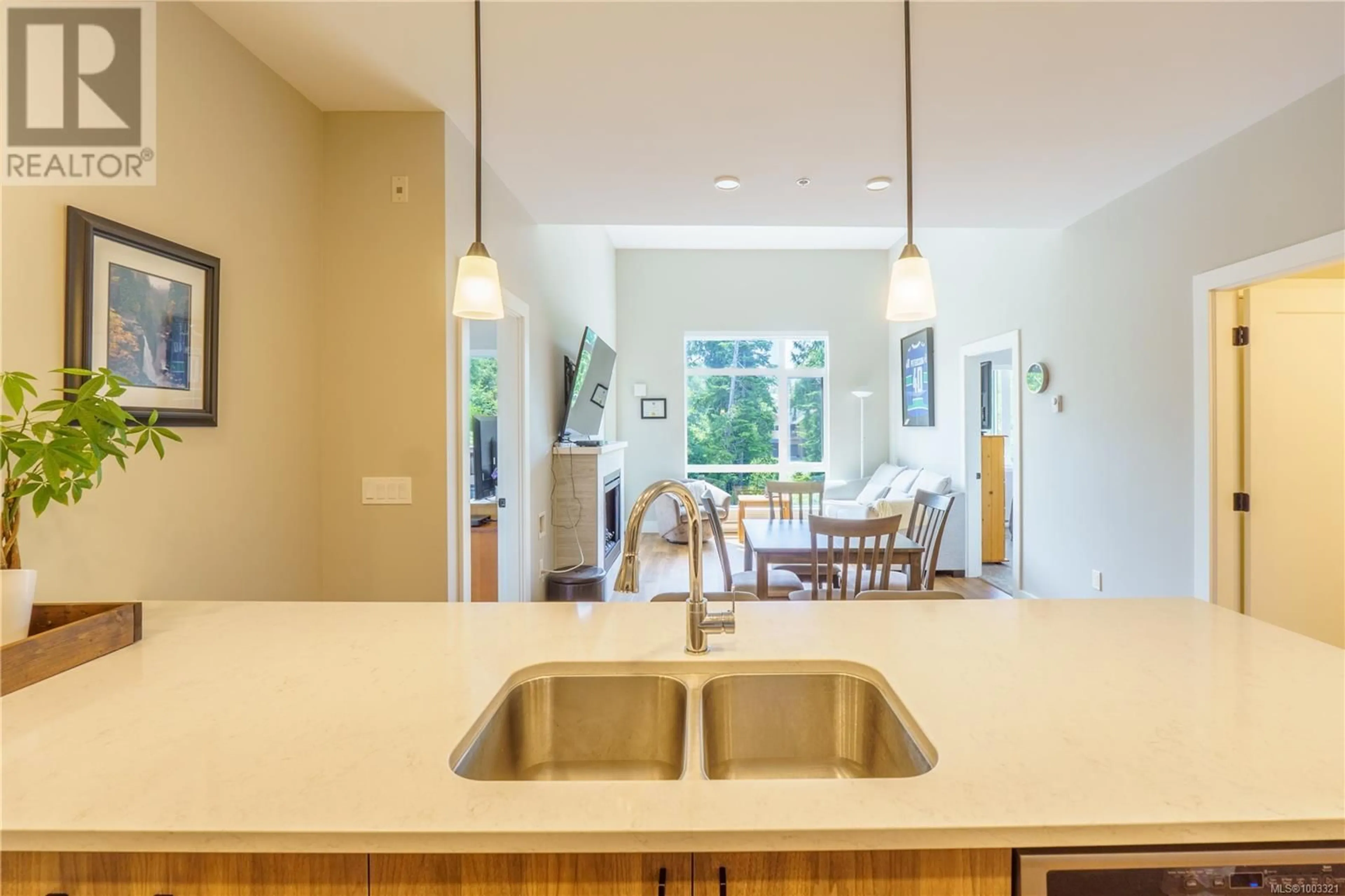 Open concept kitchen, unknown for 301 - 700 YEW WOOD ROAD, Tofino British Columbia V0R3A0
