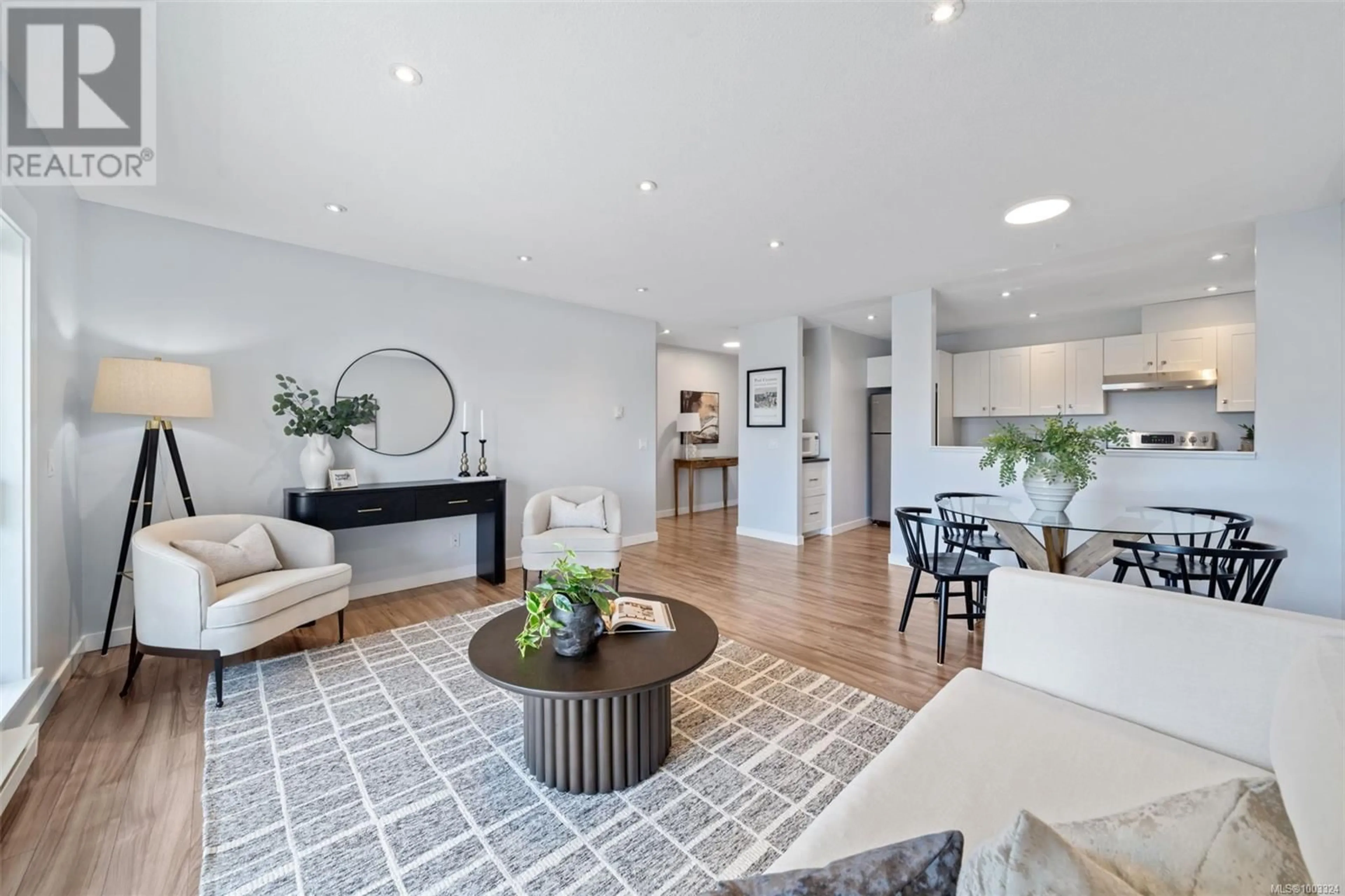 Living room with furniture, unknown for 604 - 770 CORMORANT STREET, Victoria British Columbia V8W3J3
