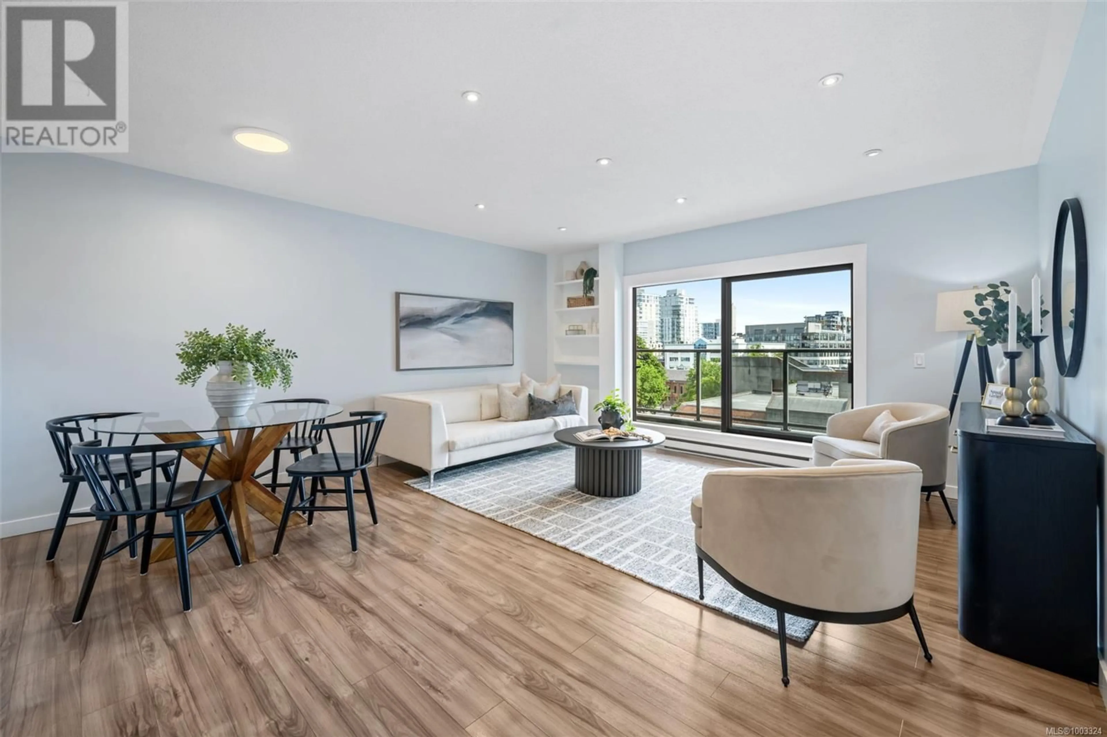 Living room with furniture, unknown for 604 - 770 CORMORANT STREET, Victoria British Columbia V8W3J3