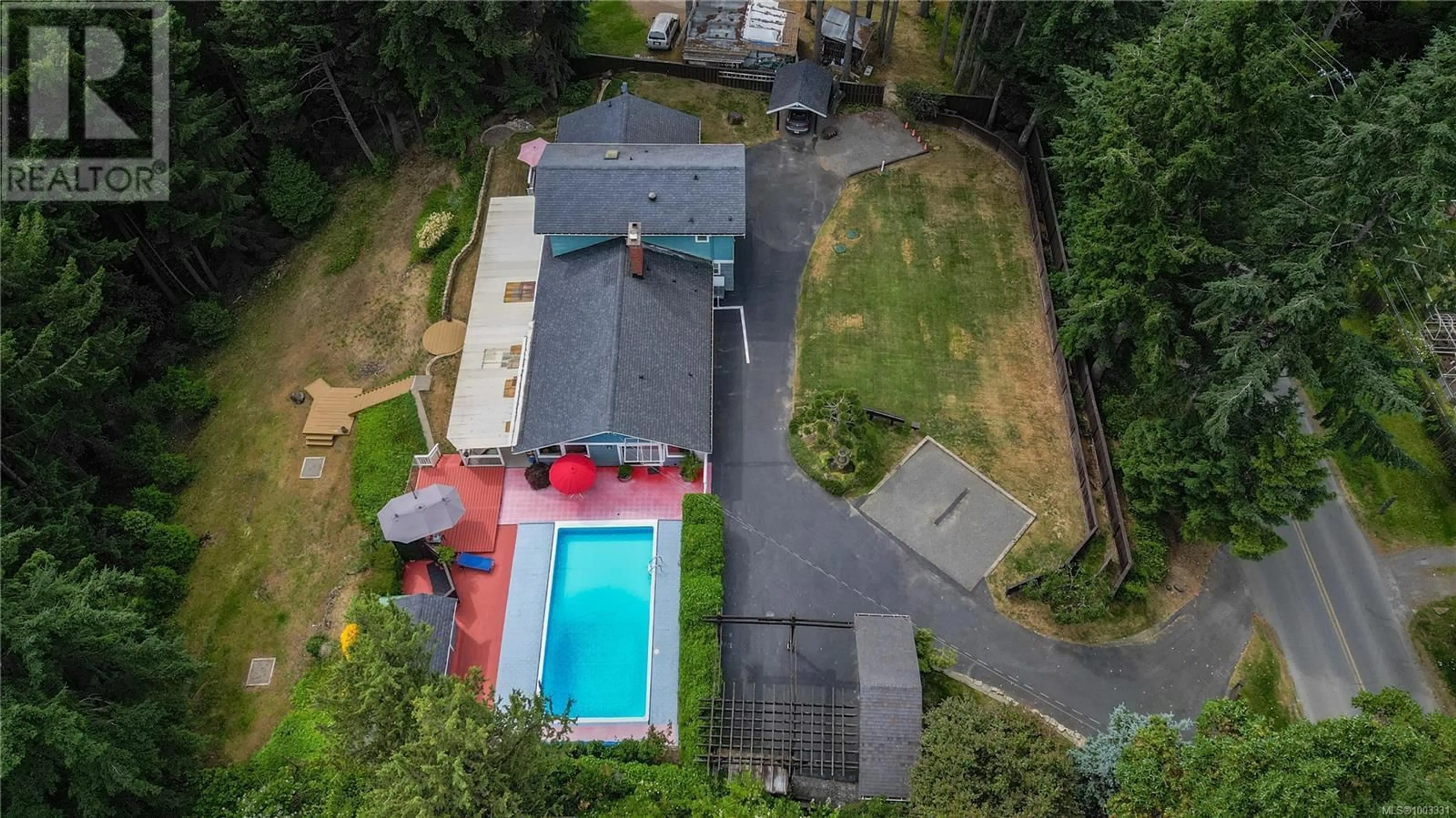 A pic from outside/outdoor area/front of a property/back of a property/a pic from drone, street for 651 VESUVIUS BAY ROAD, Salt Spring British Columbia V8K1H5
