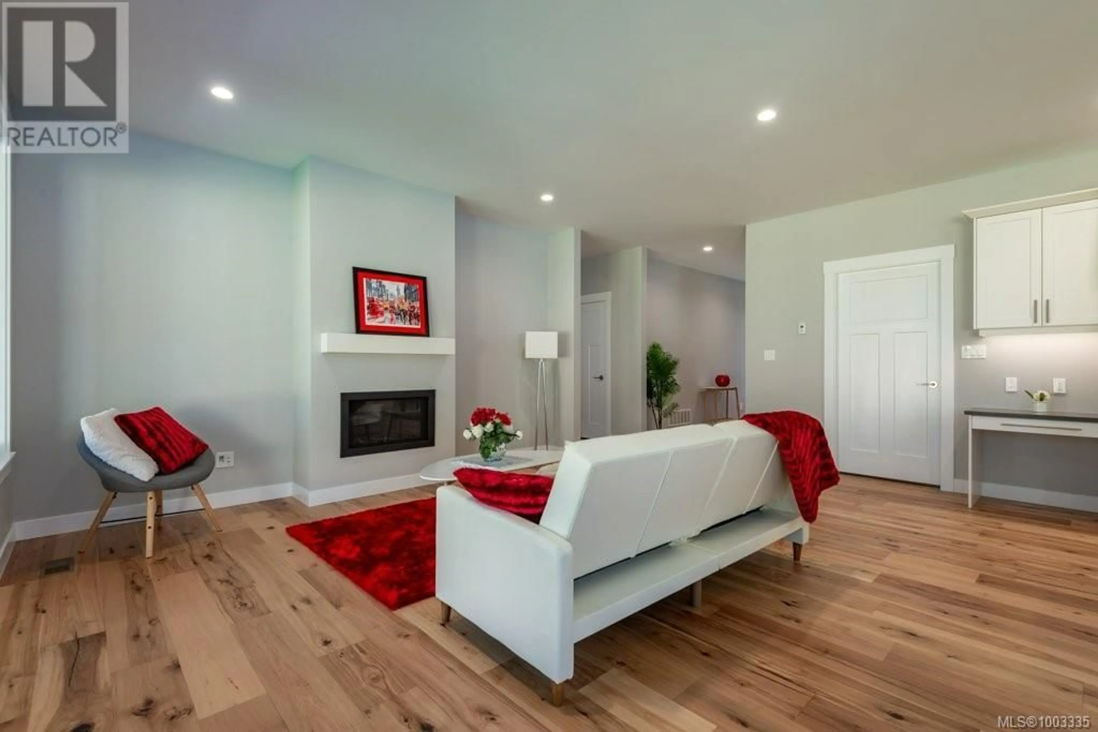 Living room with furniture, wood/laminate floor for 758 SITKA STREET, Campbell River British Columbia V9H0G4