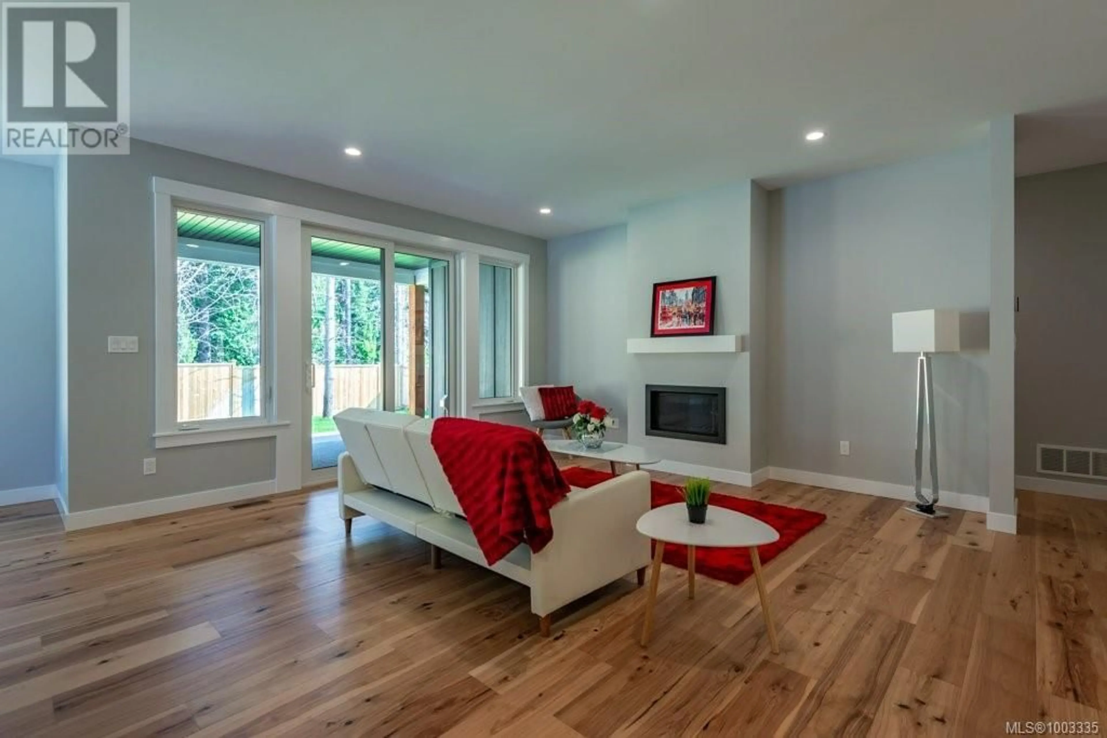 Living room with furniture, wood/laminate floor for 758 SITKA STREET, Campbell River British Columbia V9H0G4