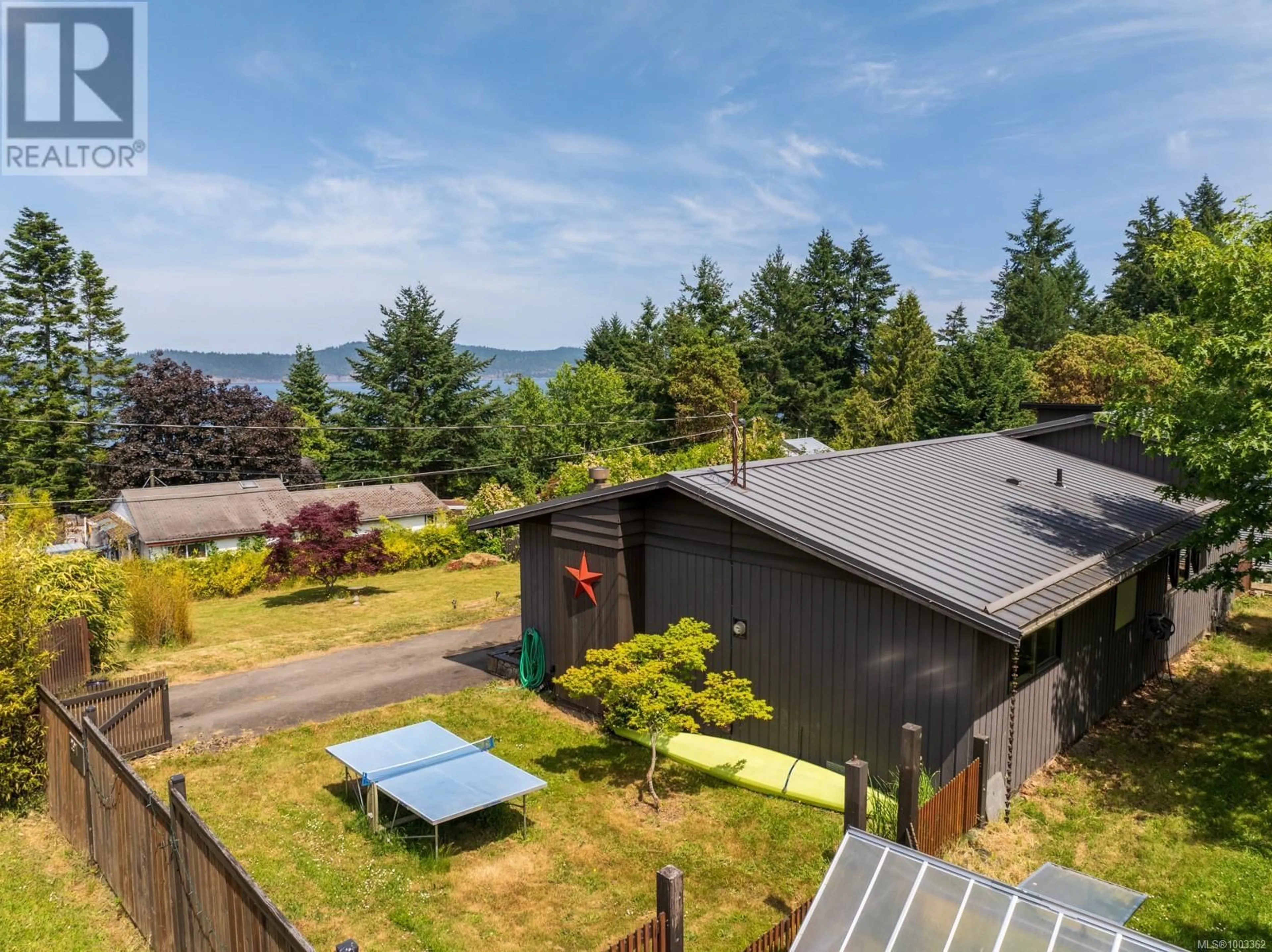 A pic from outside/outdoor area/front of a property/back of a property/a pic from drone, water/lake/river/ocean view for 291 MALIVIEW DRIVE, Salt Spring British Columbia V8K1B1