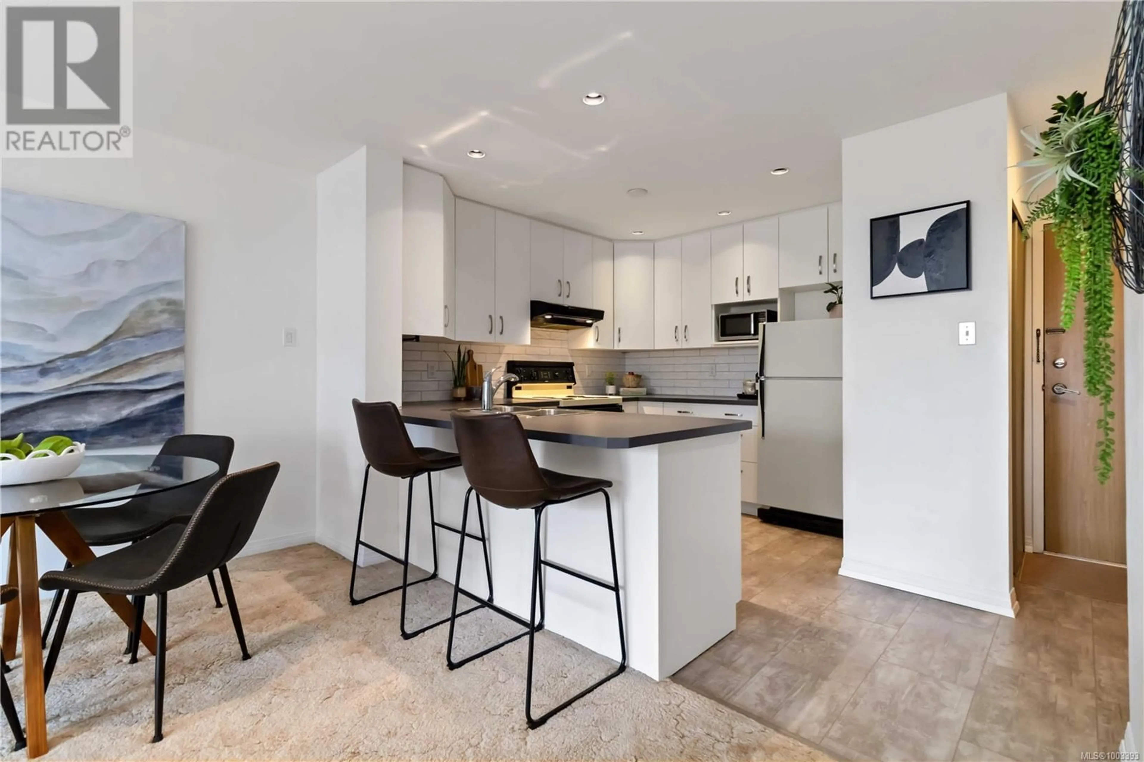Open concept kitchen, ceramic/tile floor for 509 - 1745 LEIGHTON ROAD, Victoria British Columbia V8R6R6