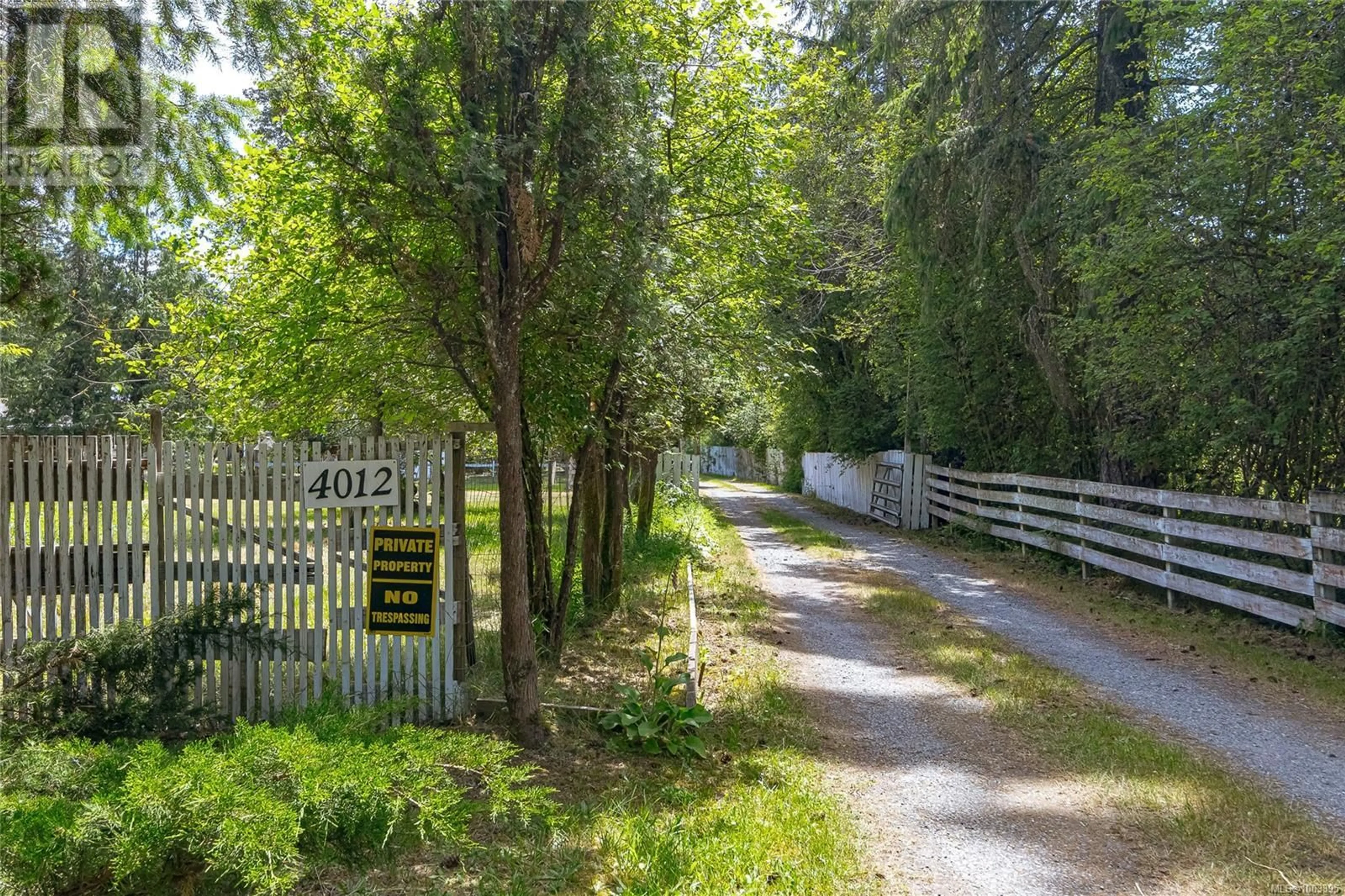 A pic from outside/outdoor area/front of a property/back of a property/a pic from drone, forest/trees view for 4012 ROBSON ROAD, Duncan British Columbia V9L6G7