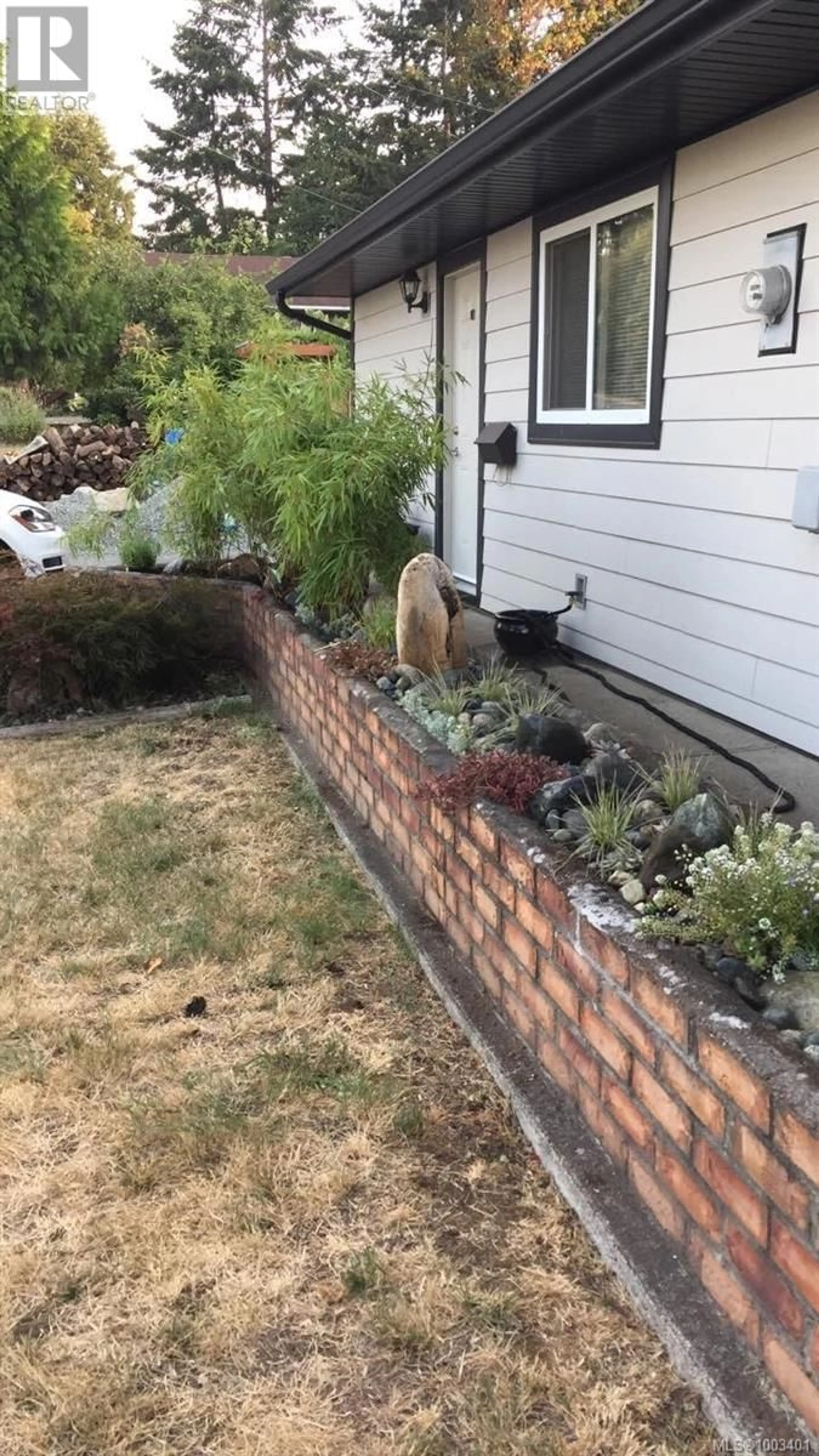 Home with brick exterior material, street for 937 HOWARD AVENUE, Nanaimo British Columbia V9R3T4