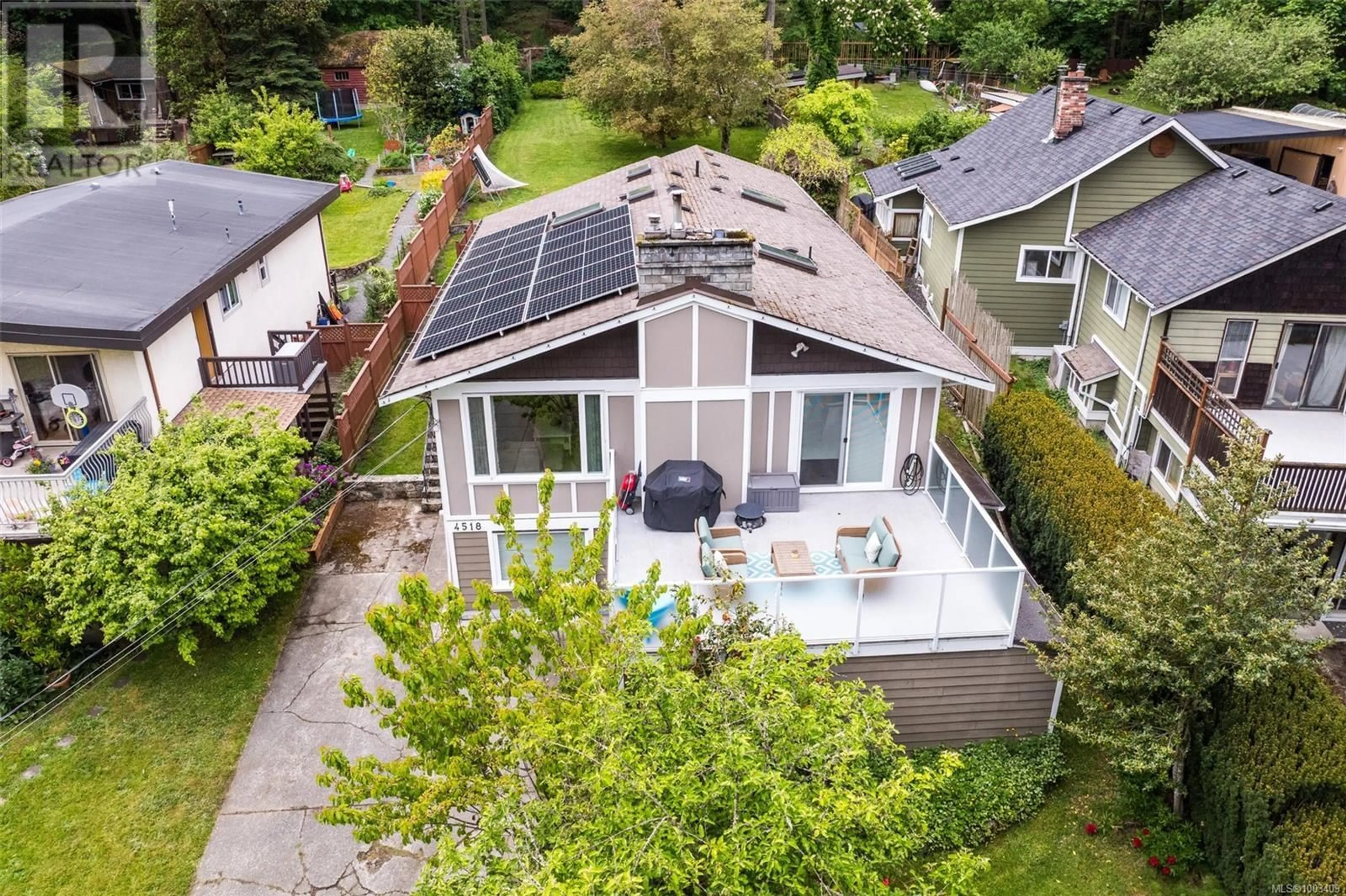 A pic from outside/outdoor area/front of a property/back of a property/a pic from drone, street for 4518 HUGHES ROAD, Saanich British Columbia V9E2B8