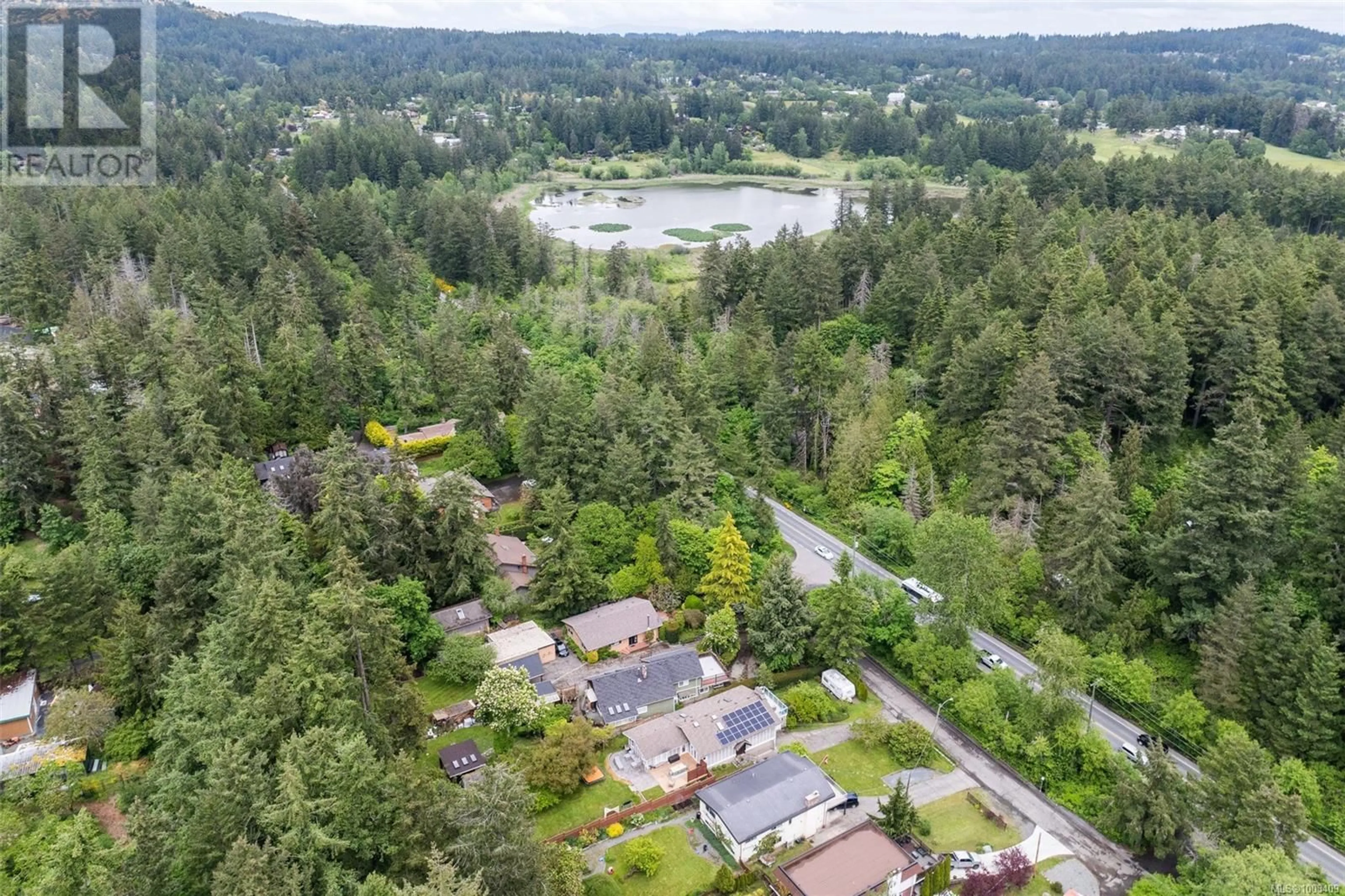 A pic from outside/outdoor area/front of a property/back of a property/a pic from drone, water/lake/river/ocean view for 4518 HUGHES ROAD, Saanich British Columbia V9E2B8