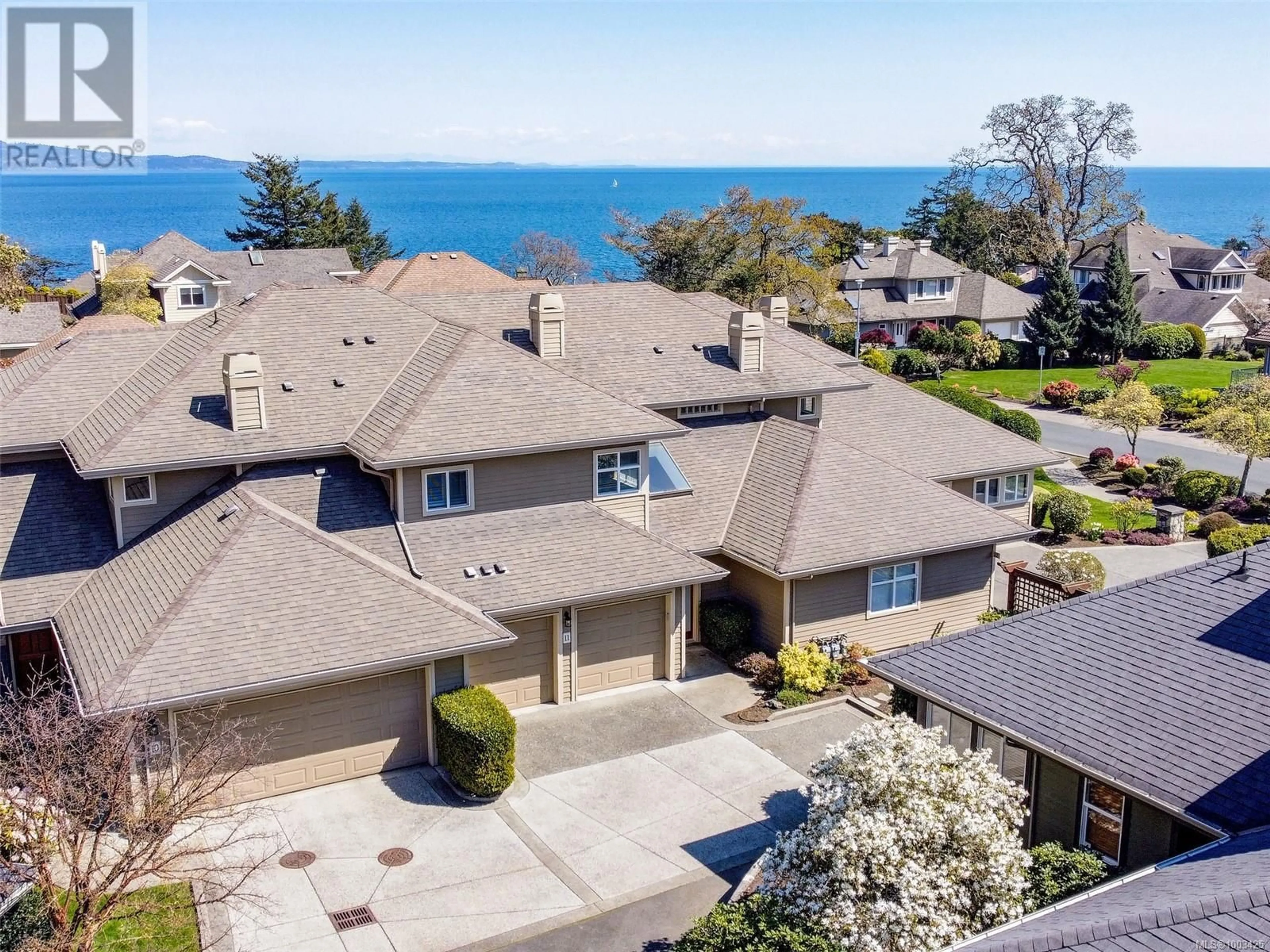A pic from outside/outdoor area/front of a property/back of a property/a pic from drone, water/lake/river/ocean view for 11 - 4522 GORDON POINT DRIVE, Saanich British Columbia V8N6L4