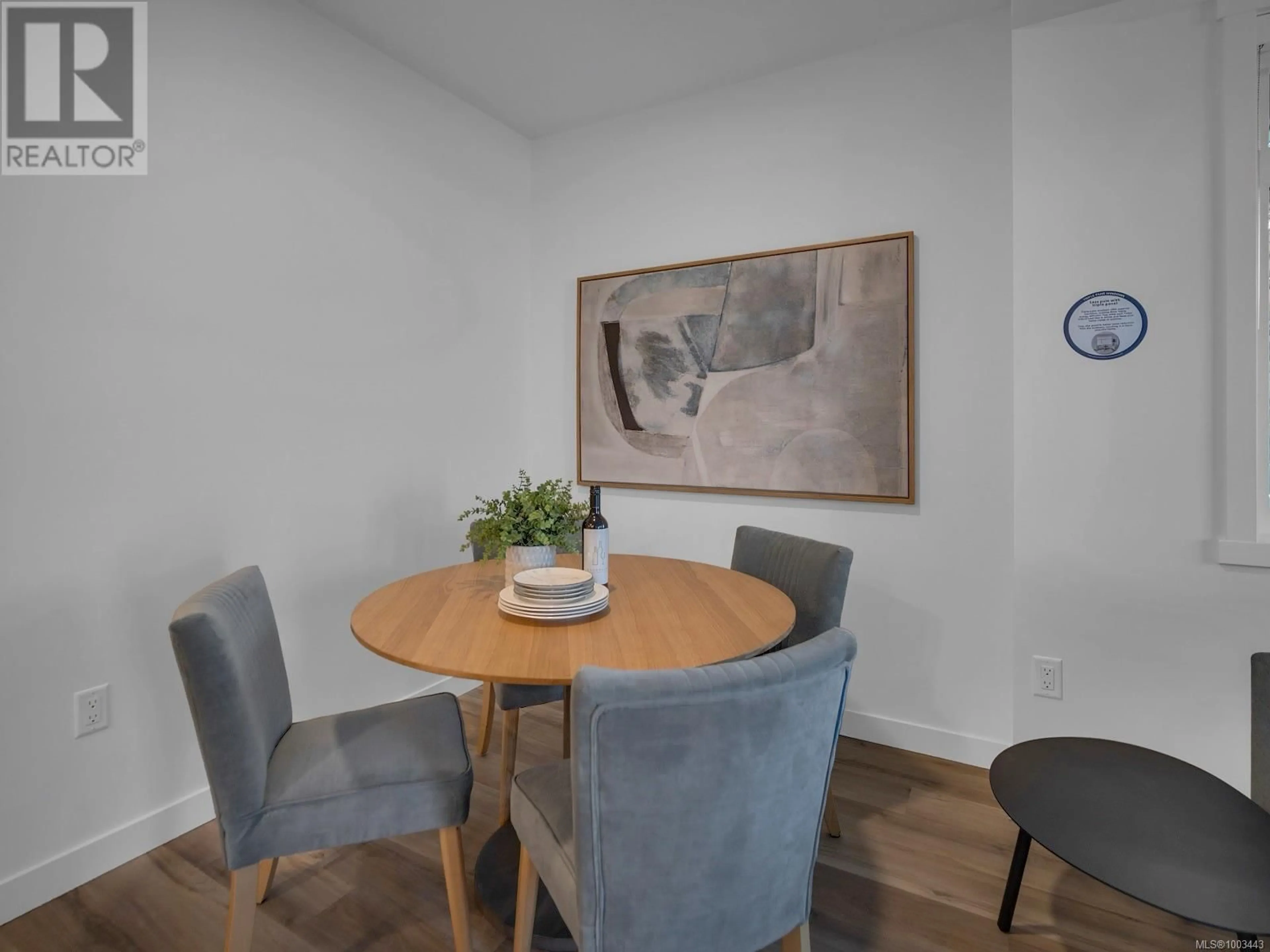 Dining room, wood/laminate floor for 319 - 2390 CITY GATE BOULEVARD, Langford British Columbia V9B7E8