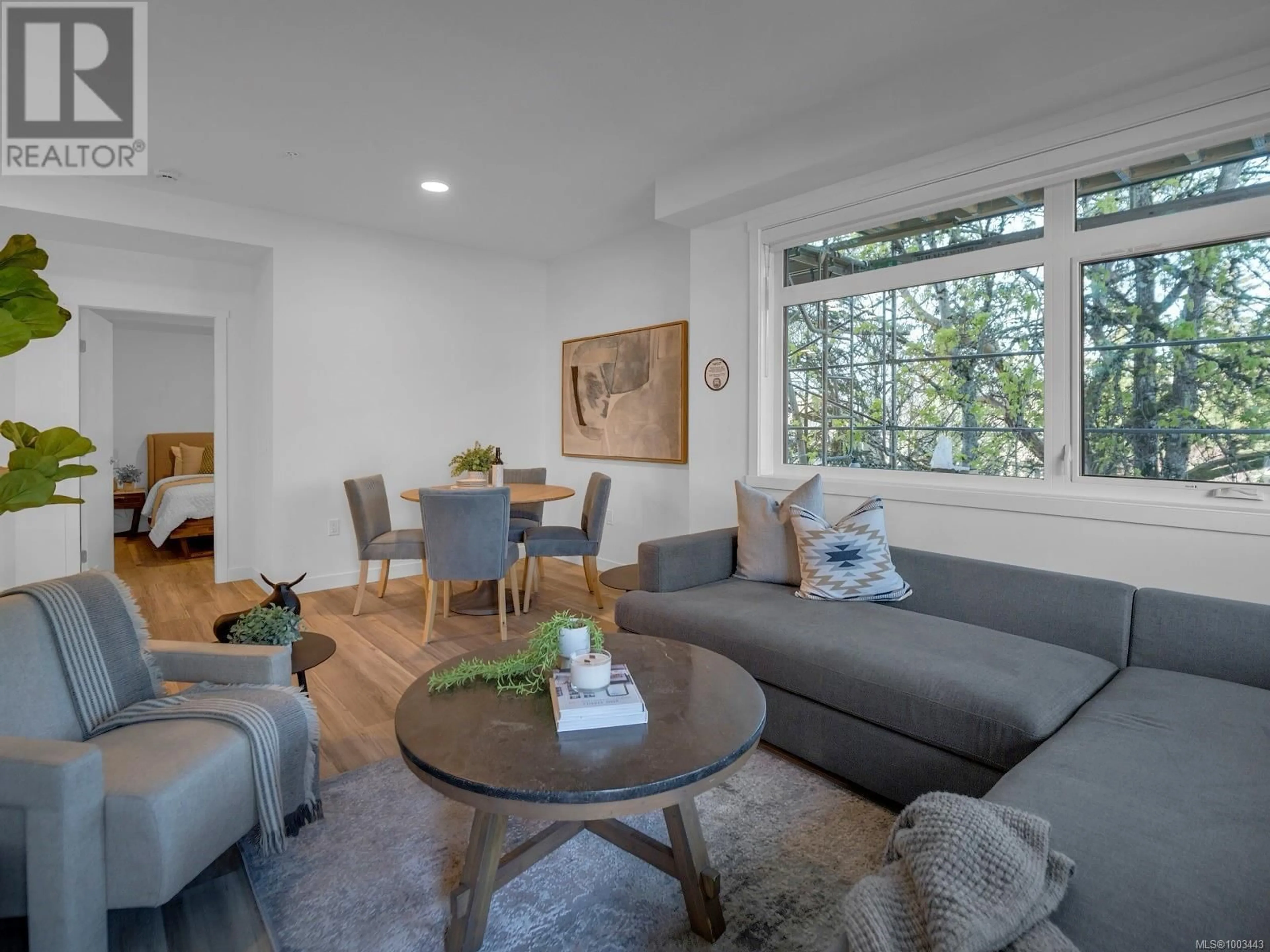 Living room with furniture, unknown for 319 - 2390 CITY GATE BOULEVARD, Langford British Columbia V9B7E8