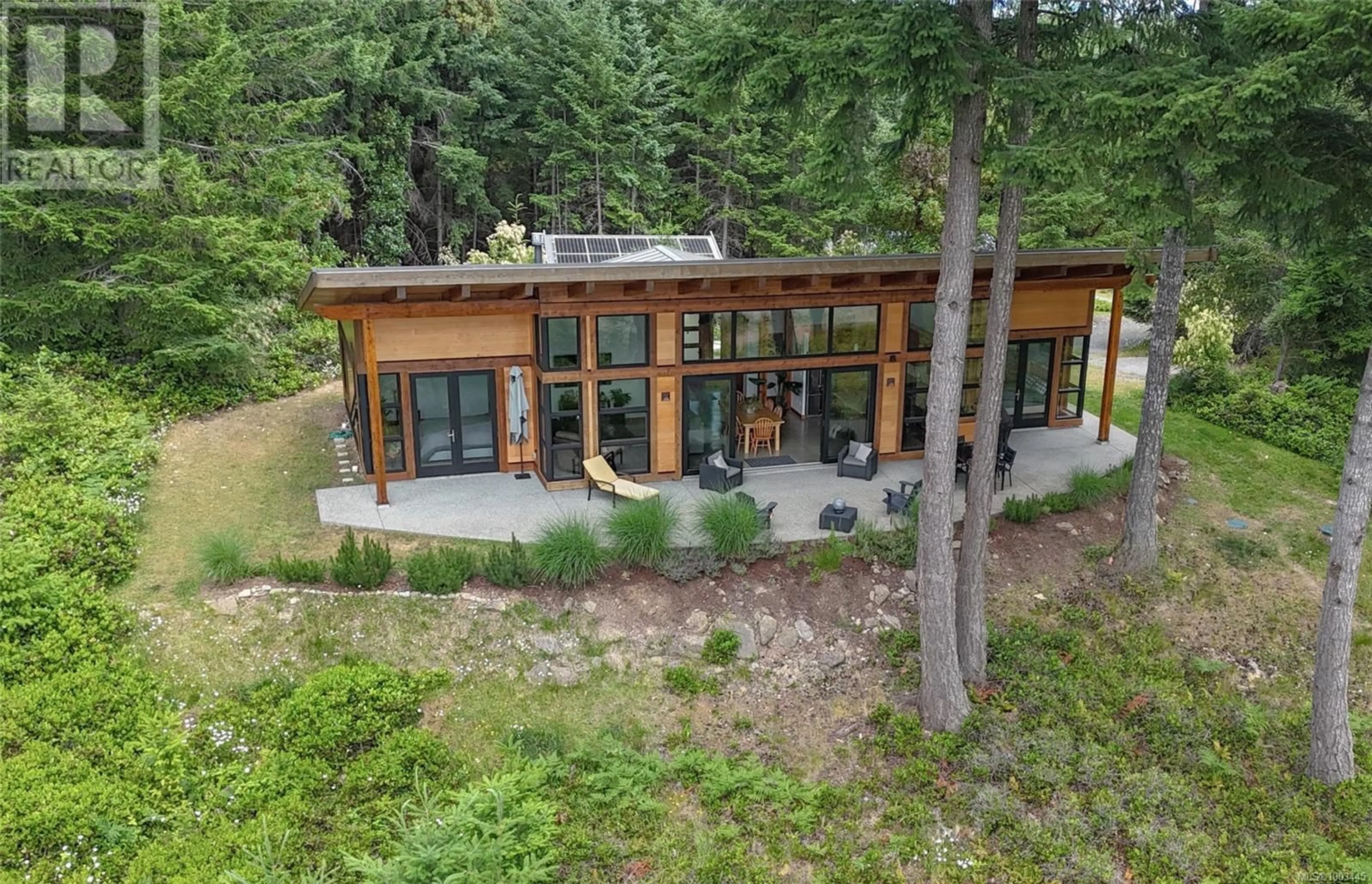 A pic from outside/outdoor area/front of a property/back of a property/a pic from drone, forest/trees view for 1965 SEYMOUR ROAD, Gabriola Island British Columbia V0R1X6