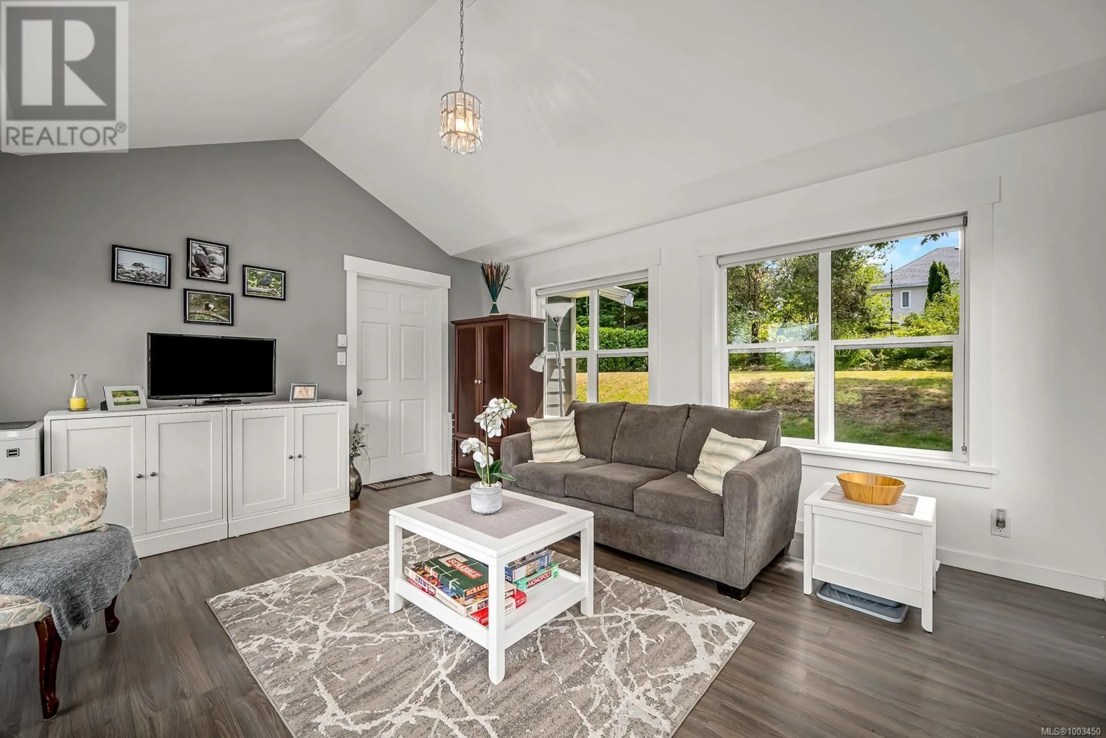 Living room with furniture, unknown for 4550 MAPLE GUARD DRIVE, Bowser British Columbia V0R1G0