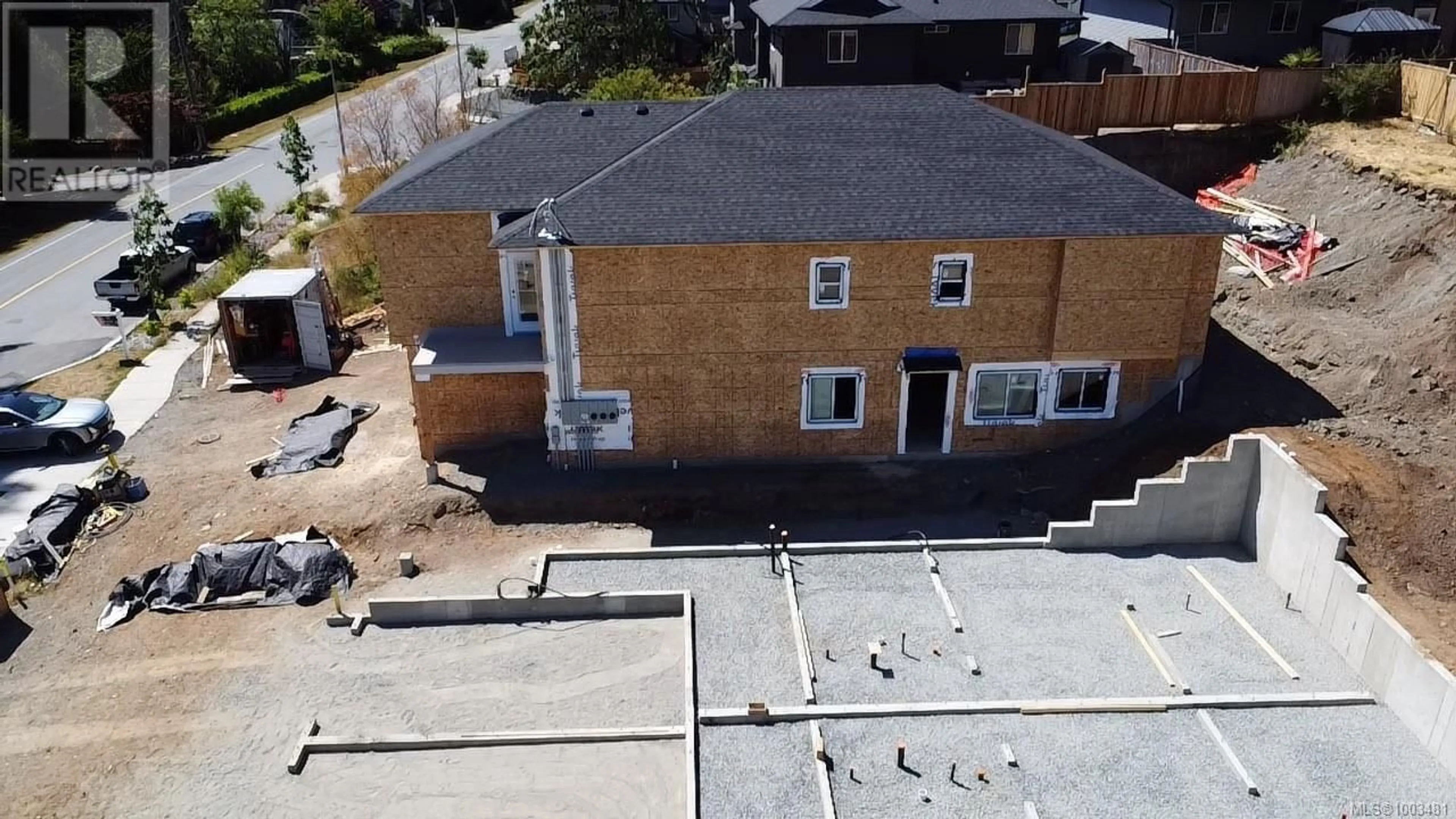 A pic from outside/outdoor area/front of a property/back of a property/a pic from drone, building for 1529 MARBAN ROAD, Nanaimo British Columbia V9X1A1