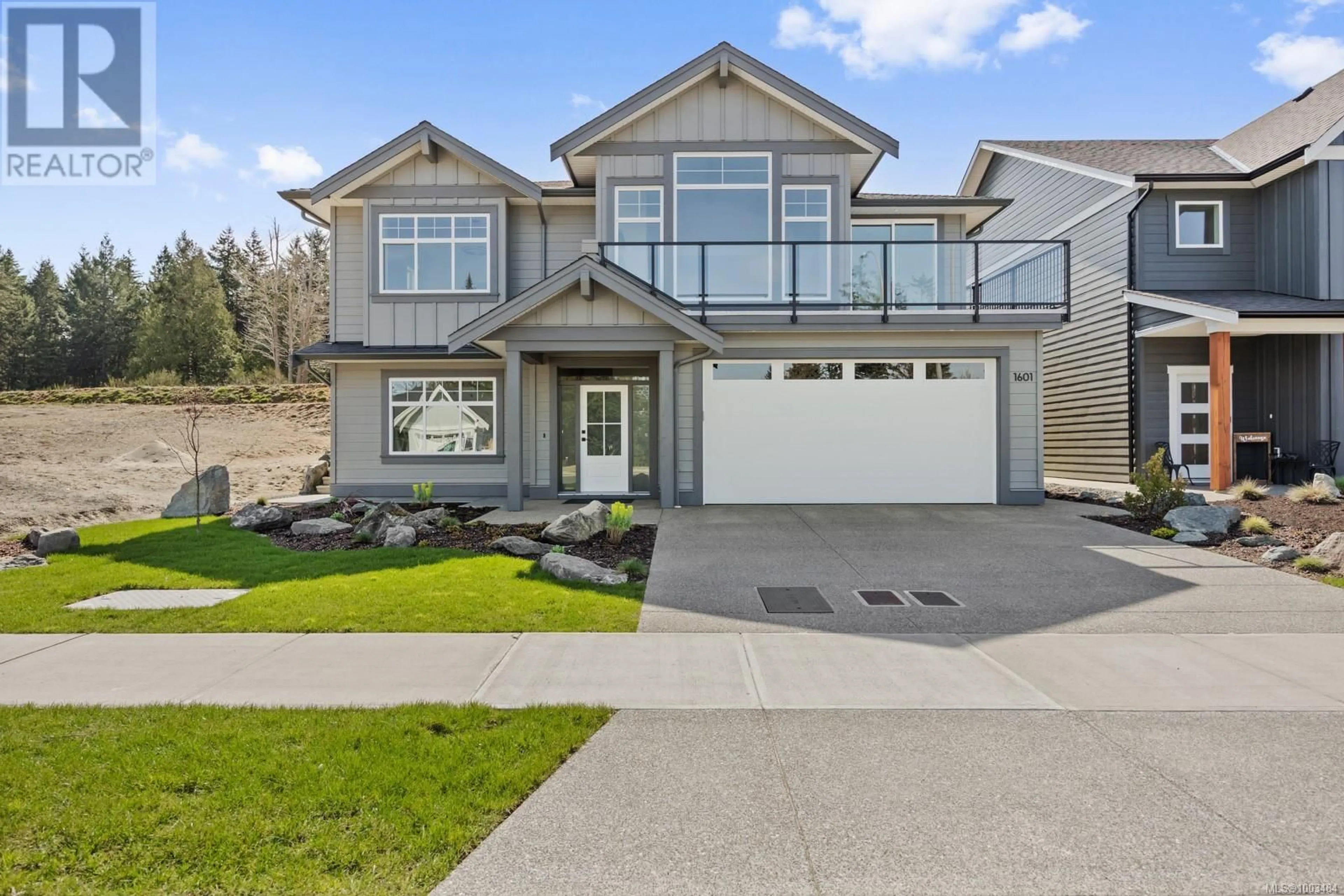 Home with vinyl exterior material, street for 1601 CROWN ISLE BOULEVARD, Courtenay British Columbia V9N9X5