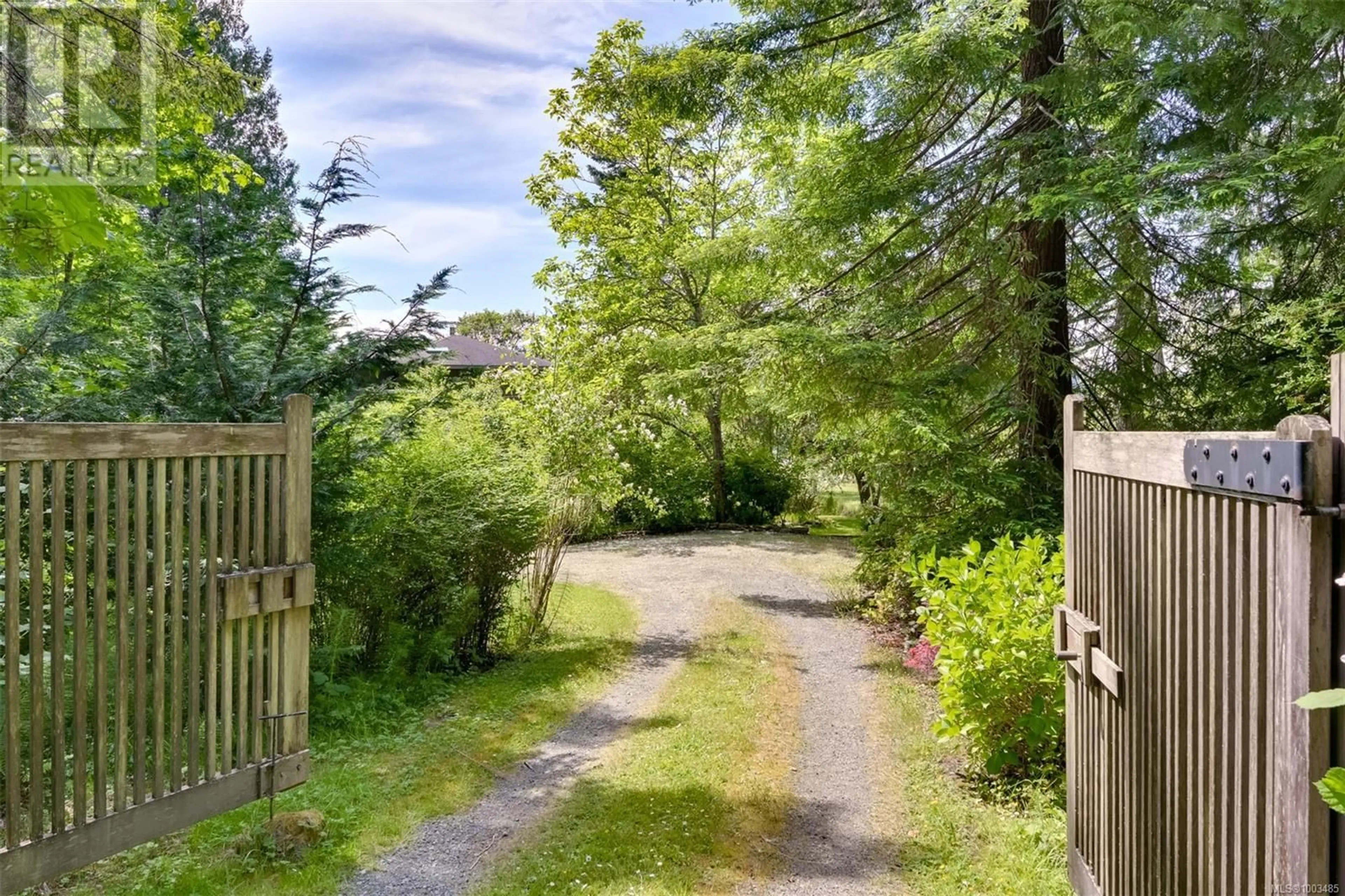 A pic from outside/outdoor area/front of a property/back of a property/a pic from drone, forest/trees view for 114 ARBUTUS ROAD, Salt Spring British Columbia V8K1A3