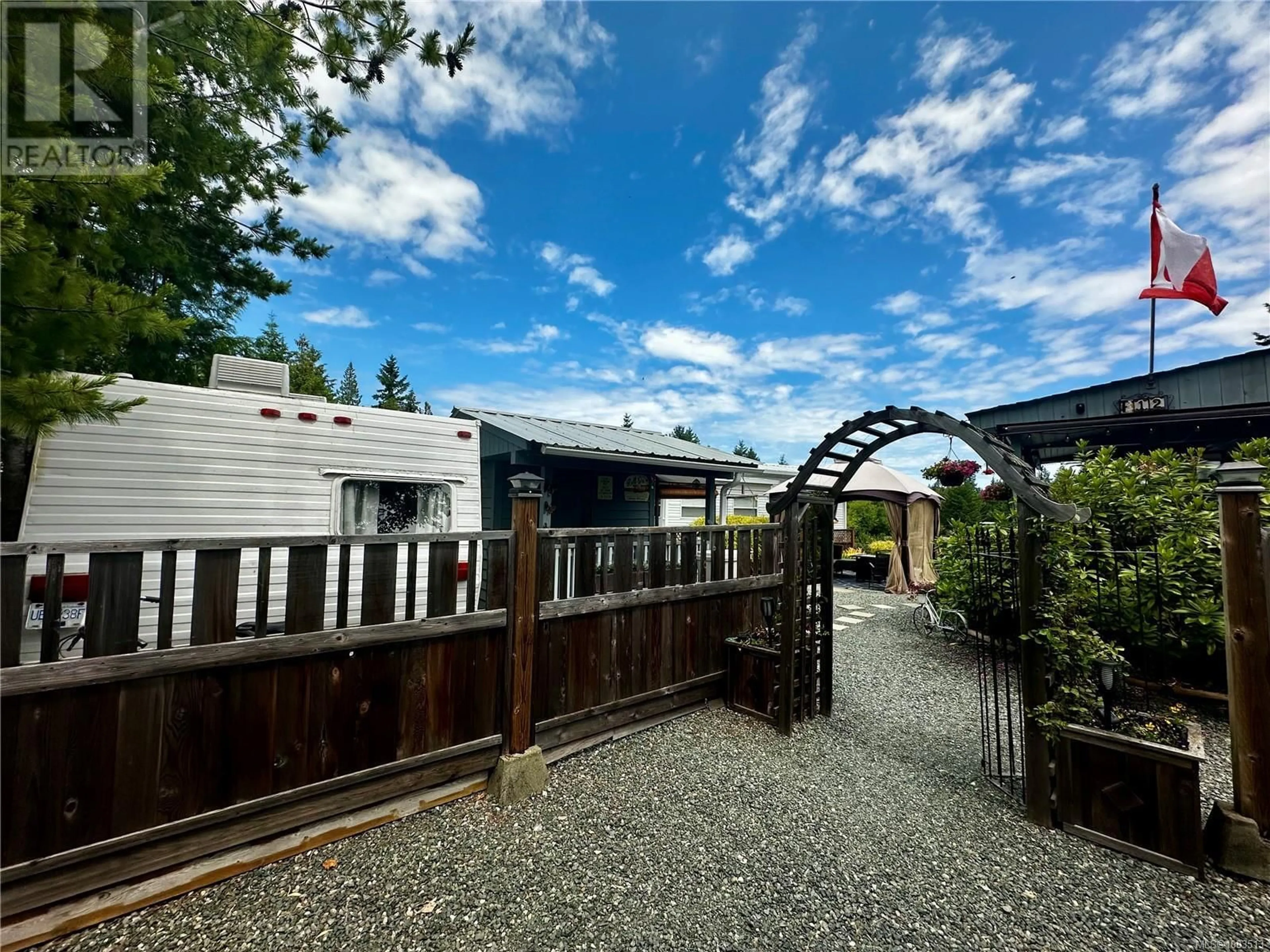 A pic from outside/outdoor area/front of a property/back of a property/a pic from drone, unknown for F12 - 2650 TURNBULL ROAD, Qualicum Beach British Columbia V9K1Z8