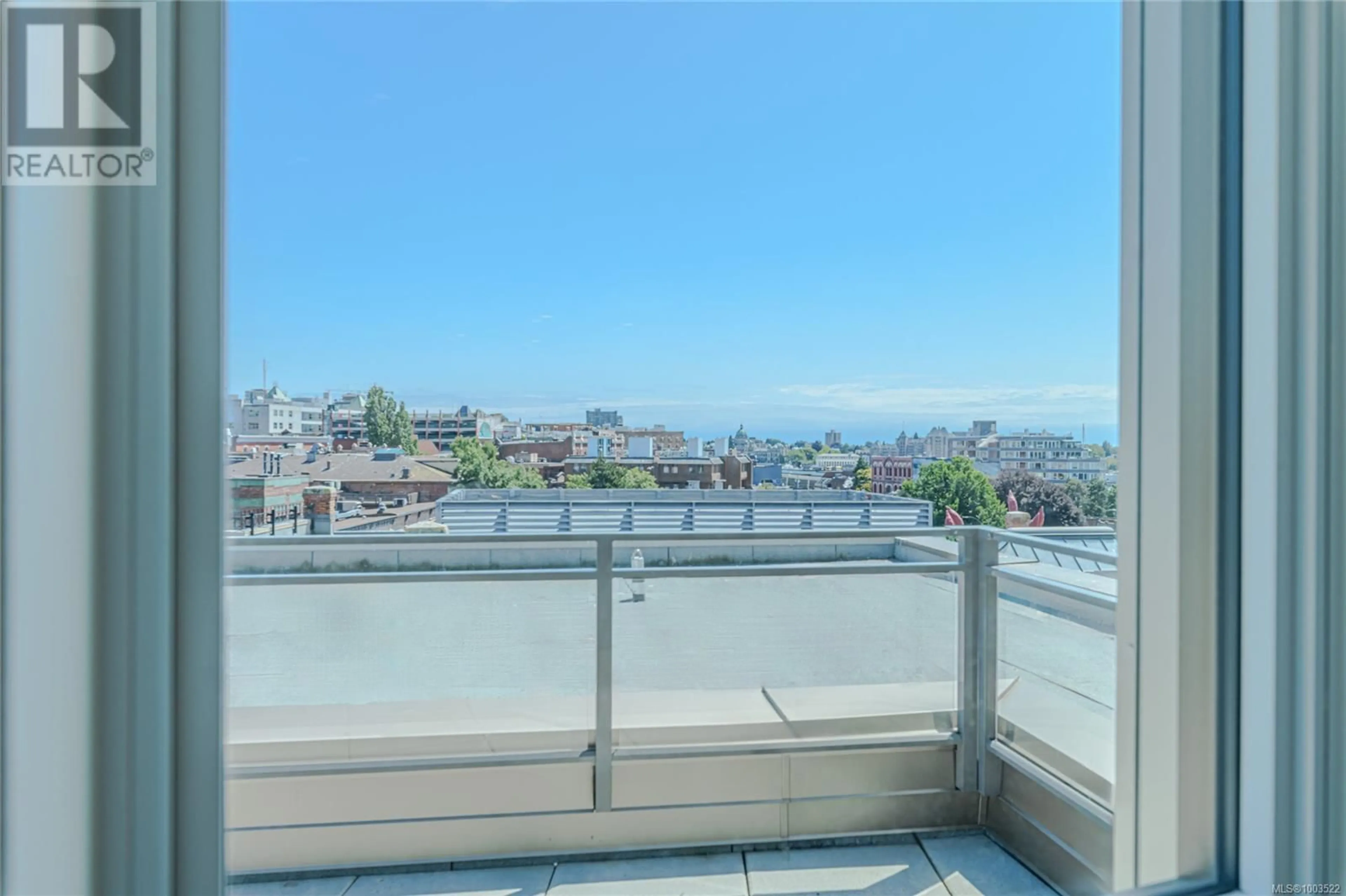 Balcony in the apartment, city buildings view from balcony for 900 - 1628 STORE STREET, Victoria British Columbia V8W0H1