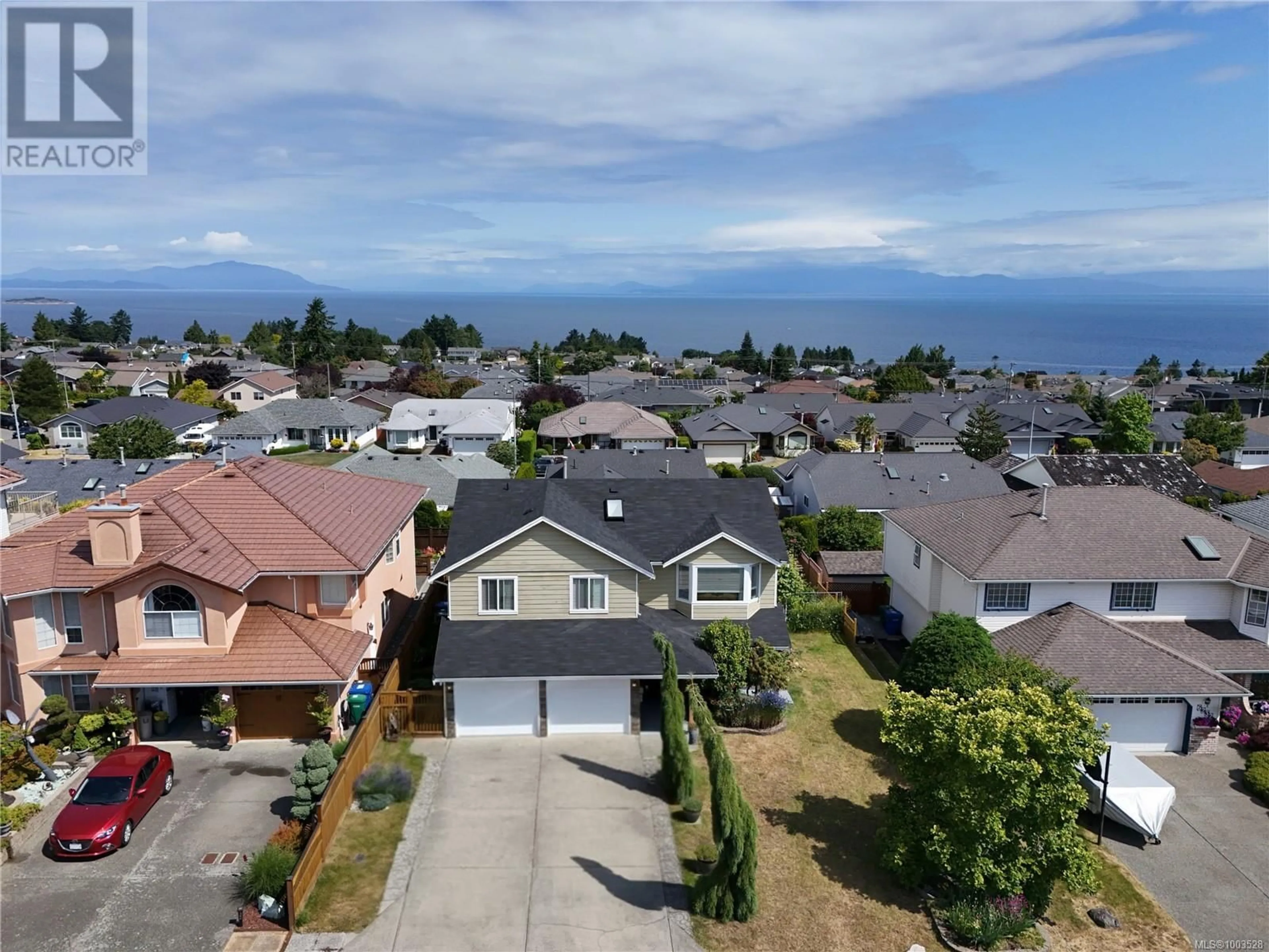 A pic from outside/outdoor area/front of a property/back of a property/a pic from drone, water/lake/river/ocean view for 6234 MYSTIC WAY, Nanaimo British Columbia V9V1L3