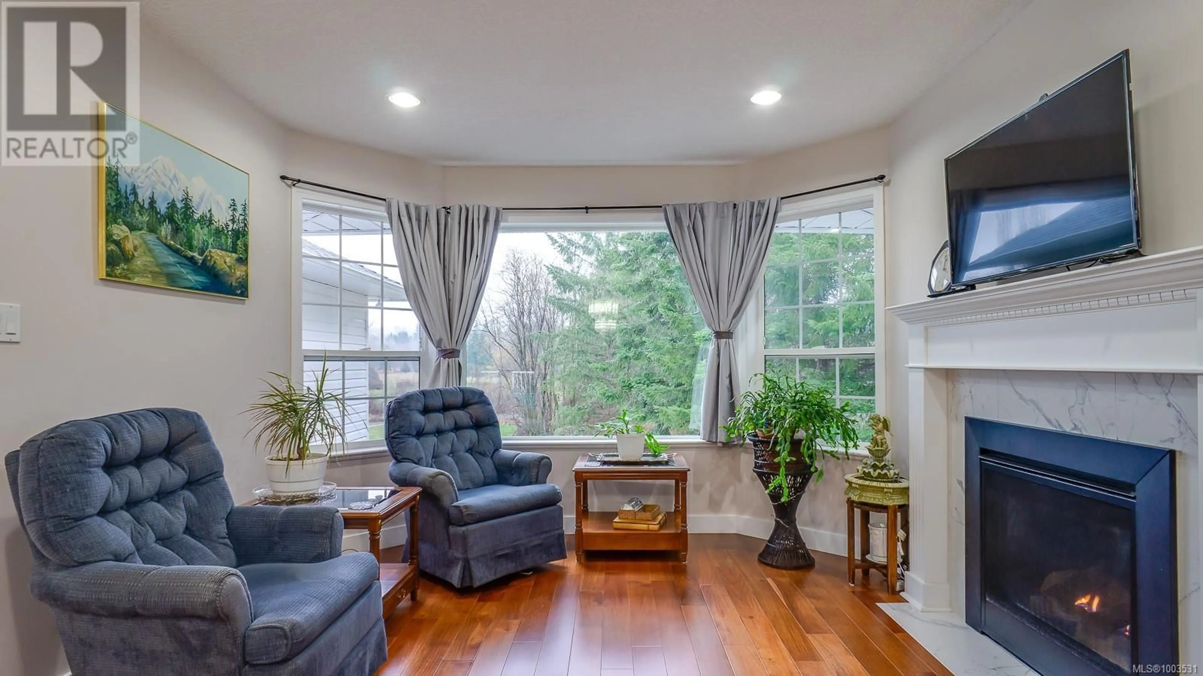 Living room with furniture, wood/laminate floor for 5084 ARDEN ROAD, Port Alberni British Columbia V9Y8R5