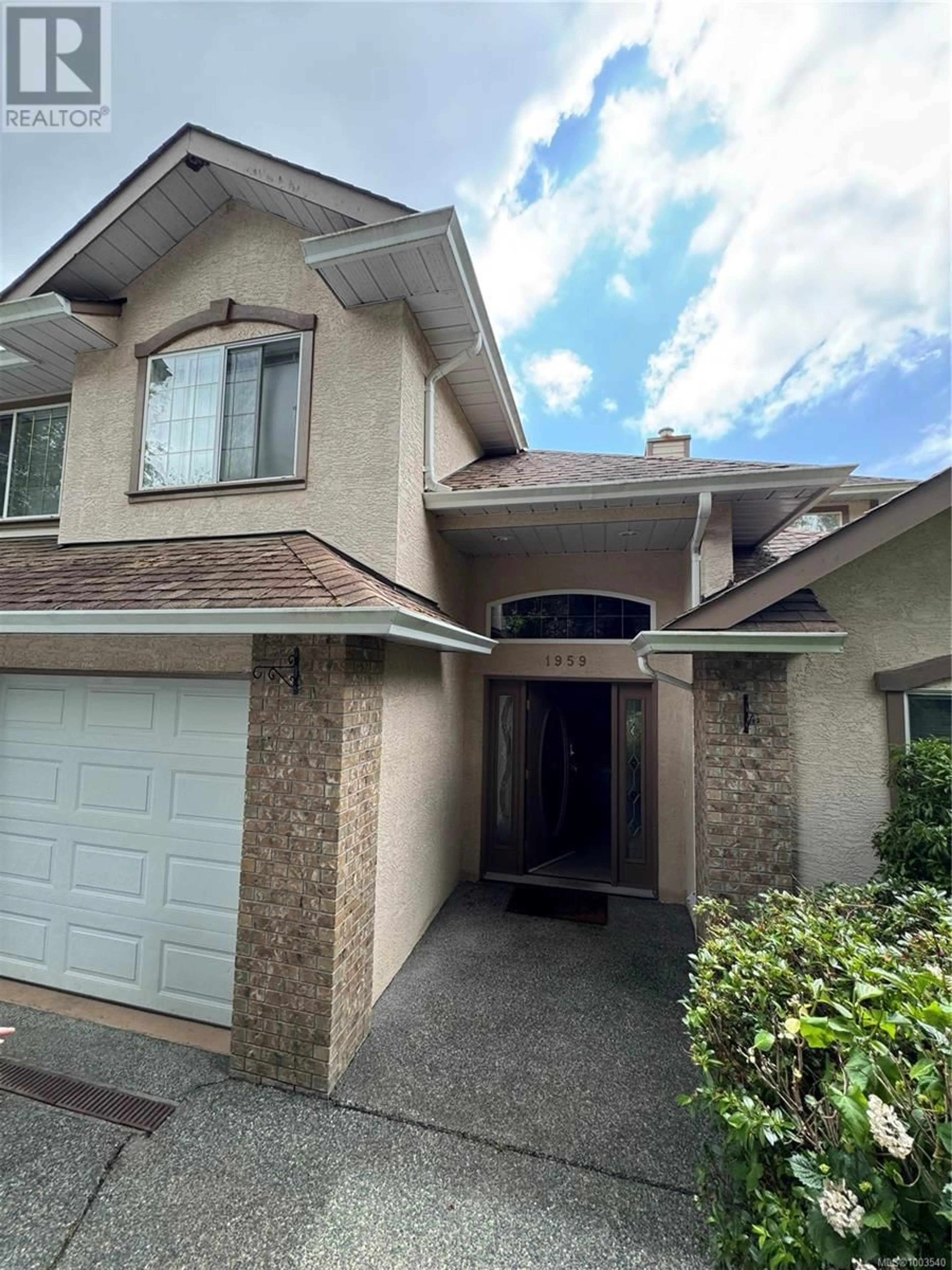 Home with vinyl exterior material, street for 1959 RIVERSIDE DRIVE, View Royal British Columbia V9E1K7