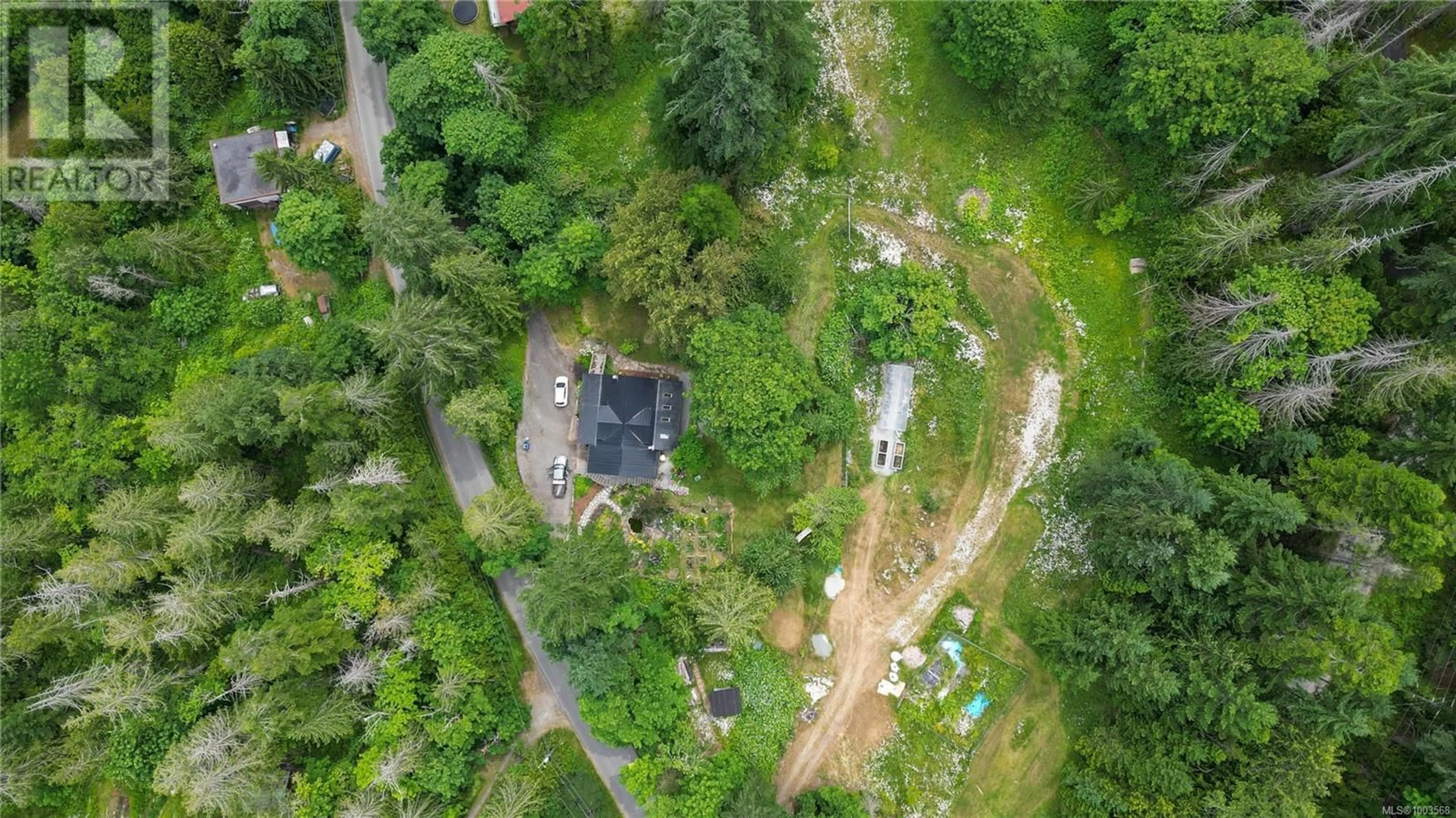 A pic from outside/outdoor area/front of a property/back of a property/a pic from drone, street for 315 BOOTH CANAL ROAD, Salt Spring British Columbia V8K2N2
