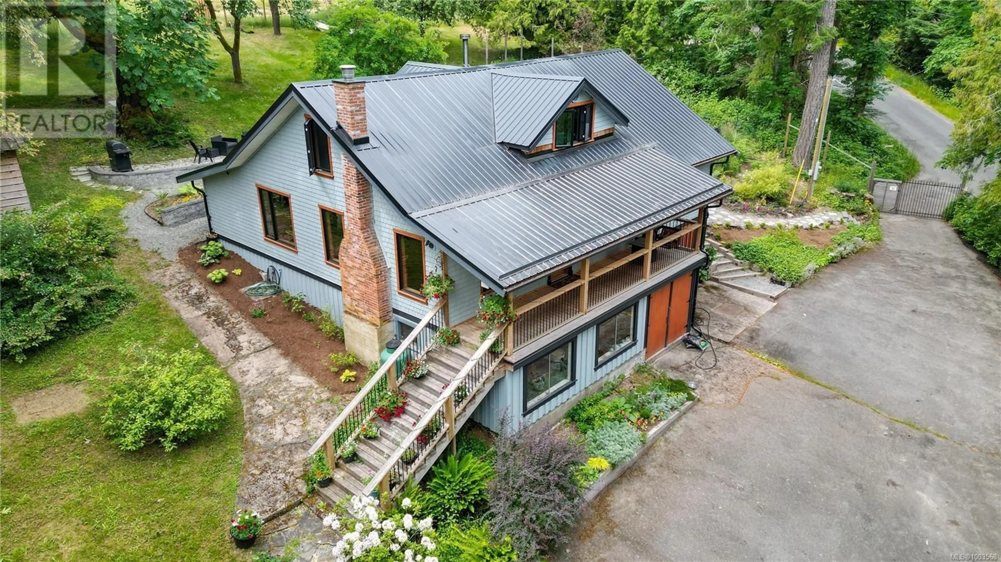A pic from outside/outdoor area/front of a property/back of a property/a pic from drone, building for 315 BOOTH CANAL ROAD, Salt Spring British Columbia V8K2N2