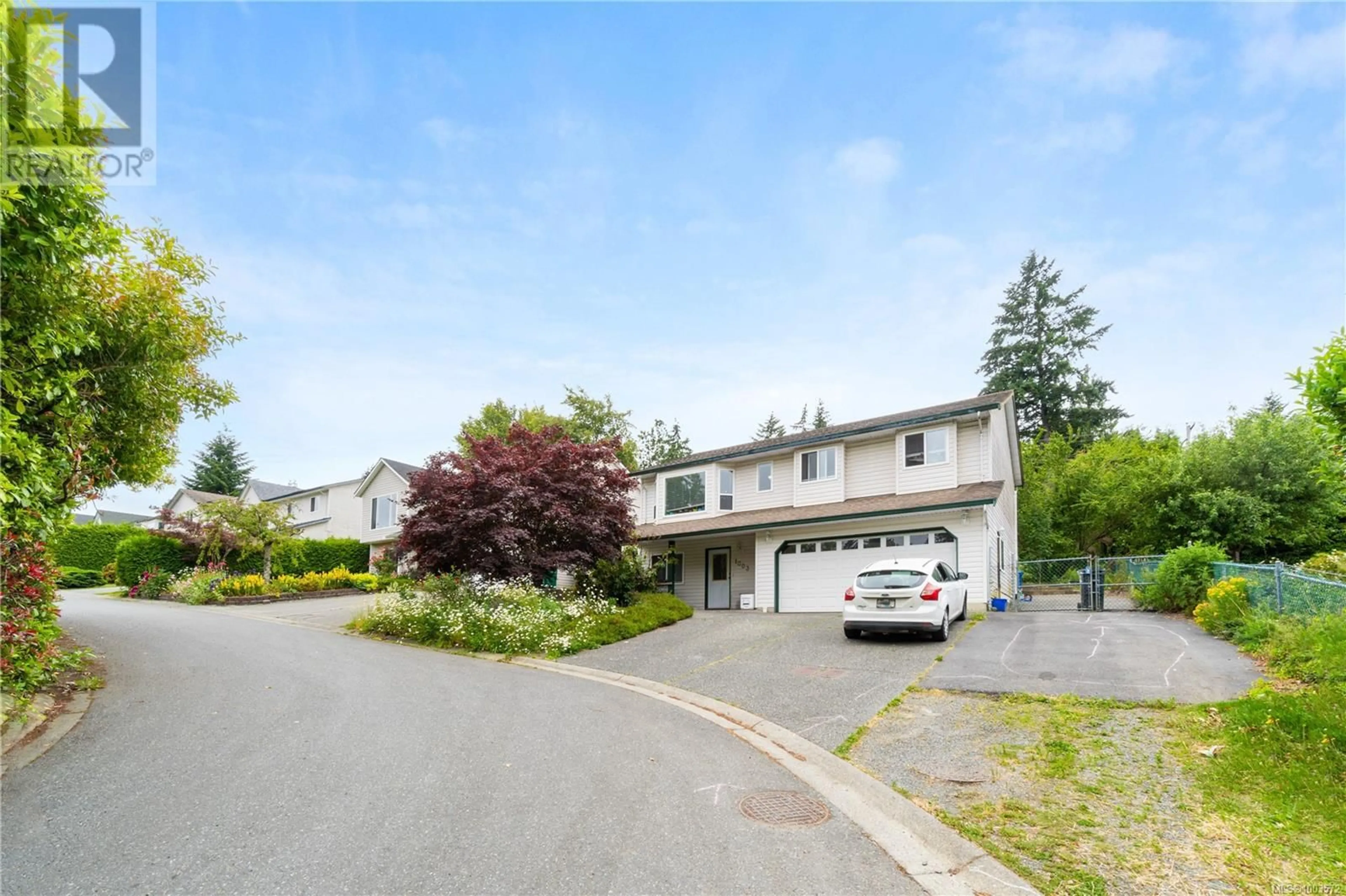 A pic from outside/outdoor area/front of a property/back of a property/a pic from drone, street for 1003 BRAMBLEWOOD LANE, Nanaimo British Columbia V9R6N9