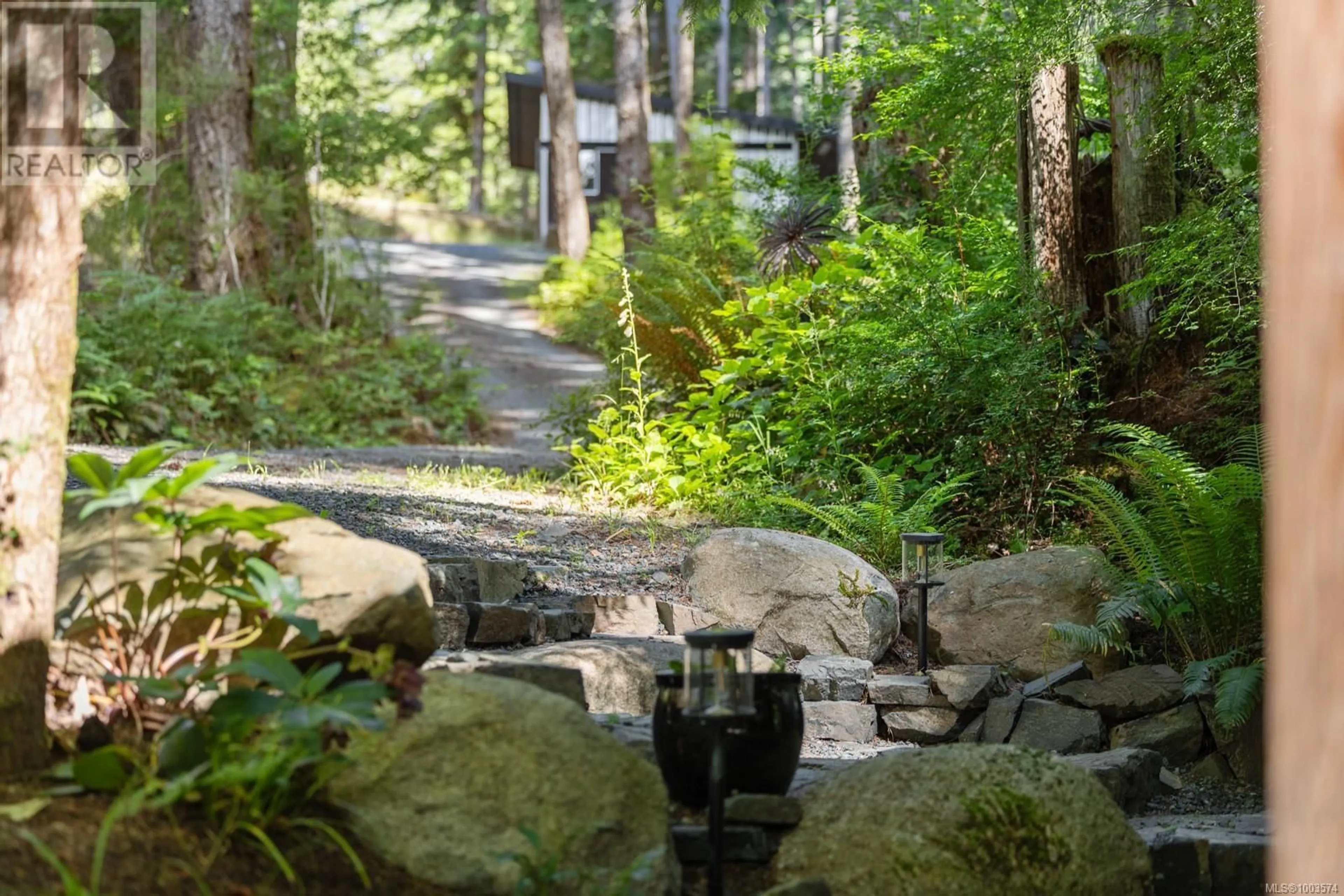 Patio, forest/trees view for 936 GOWLLAND HARBOUR ROAD, Quadra Island British Columbia V0P0A7