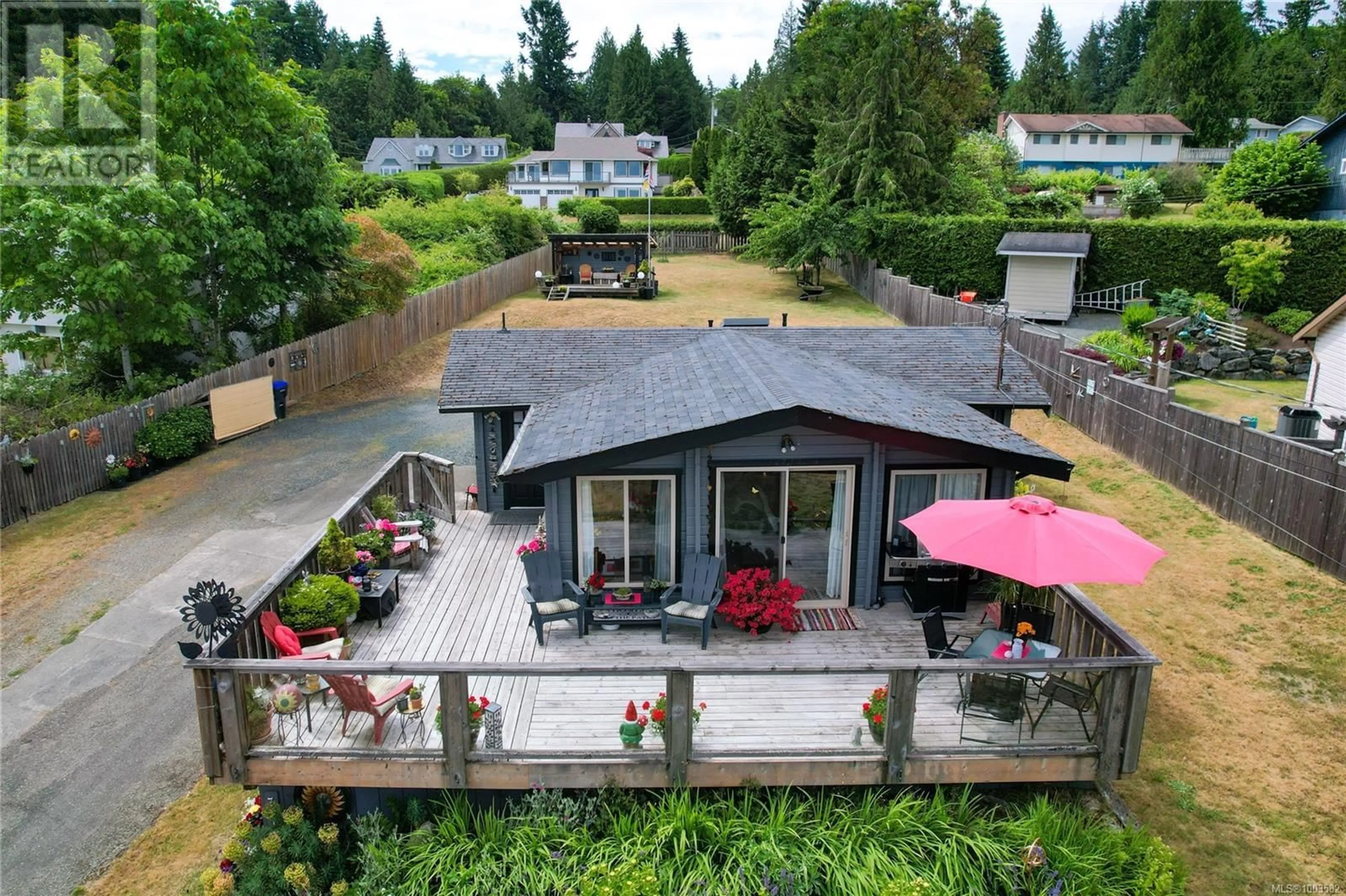 A pic from outside/outdoor area/front of a property/back of a property/a pic from drone, unknown for 7011 DICKINSON ROAD, Lantzville British Columbia V0R2H0