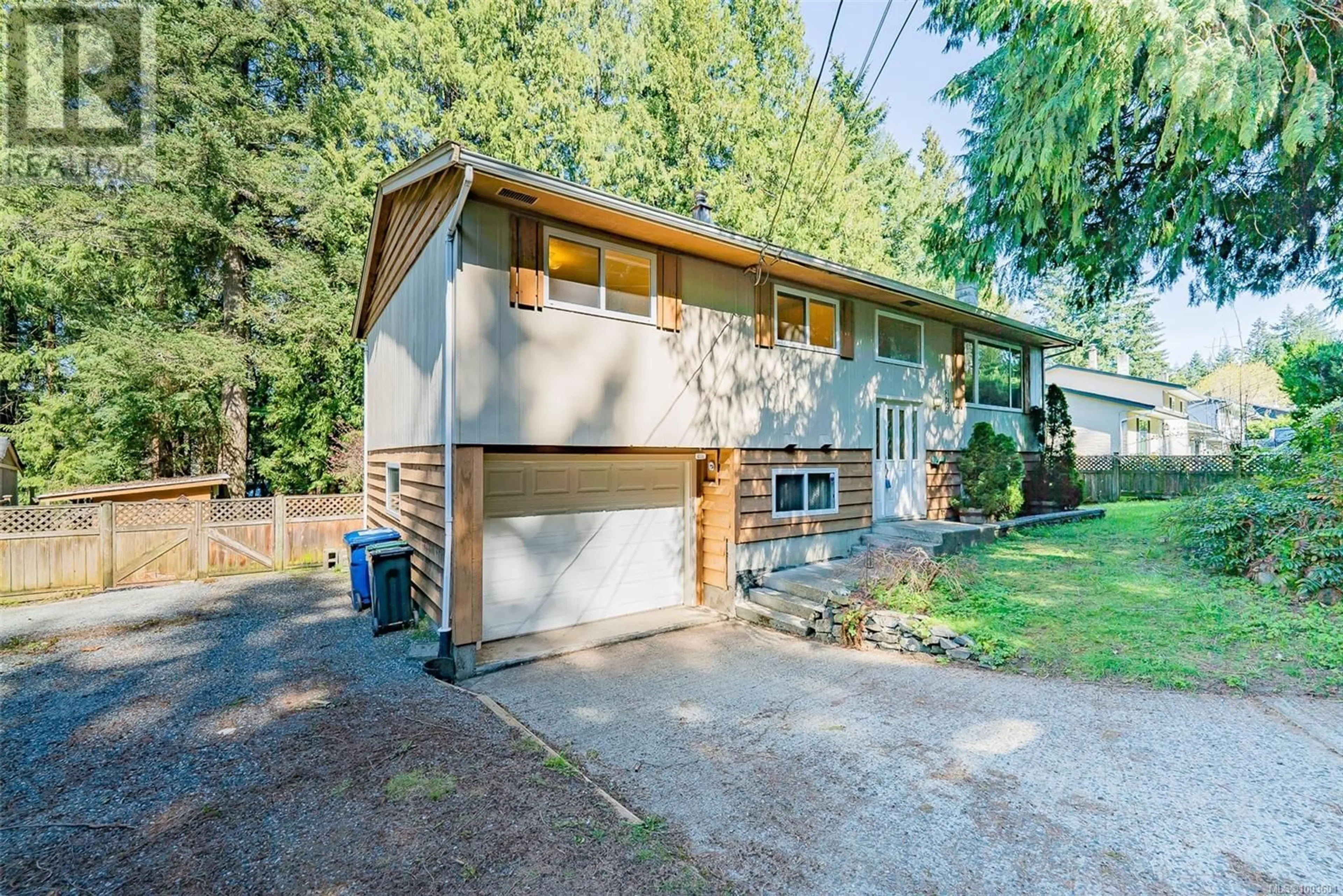 Home with vinyl exterior material, street for 2702 BEAVER CREEK CRESCENT, Nanaimo British Columbia V9T3K4