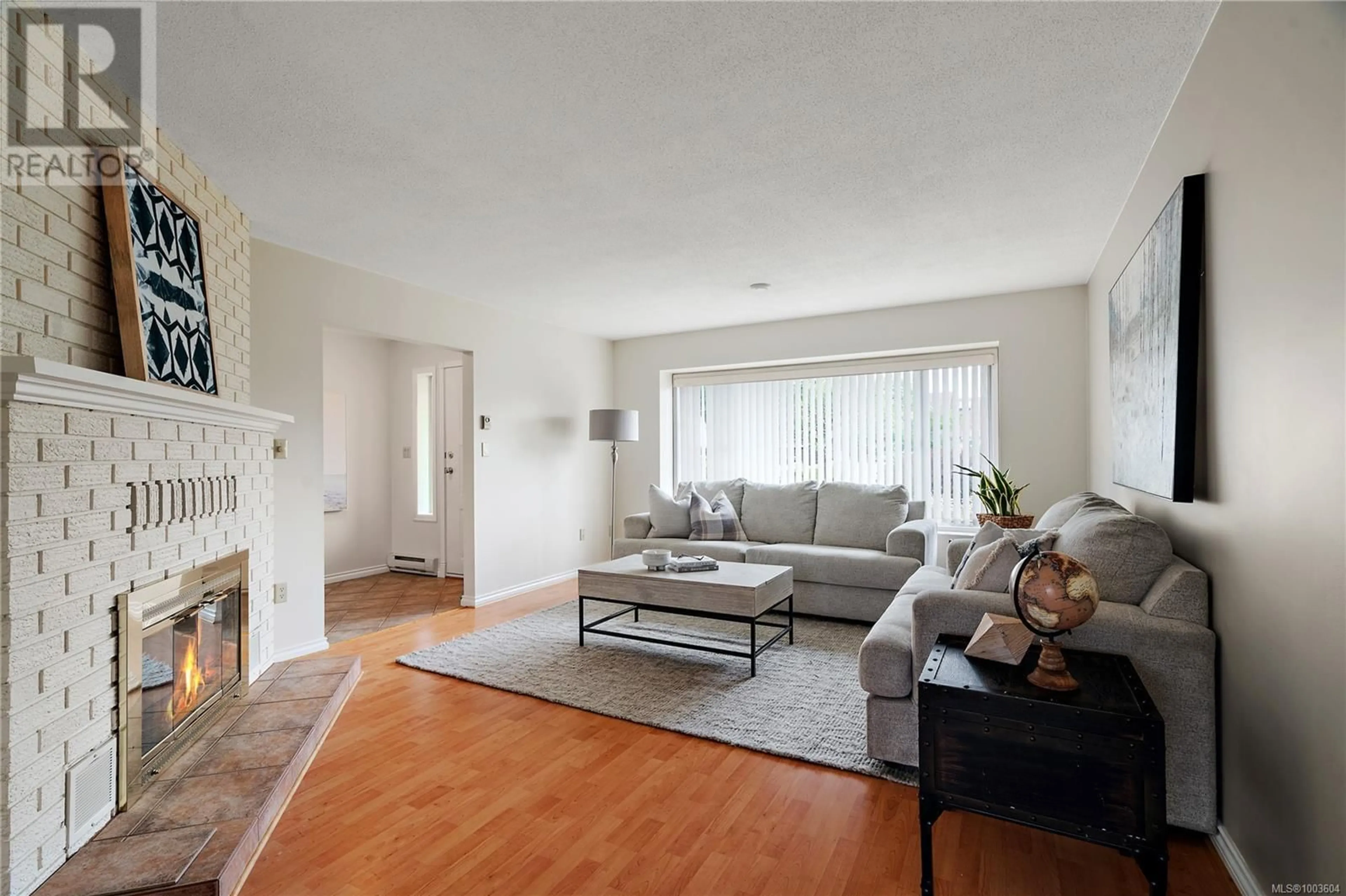 Living room with furniture, unknown for 2109 REDWING PLACE, Sidney British Columbia V8L4Z4