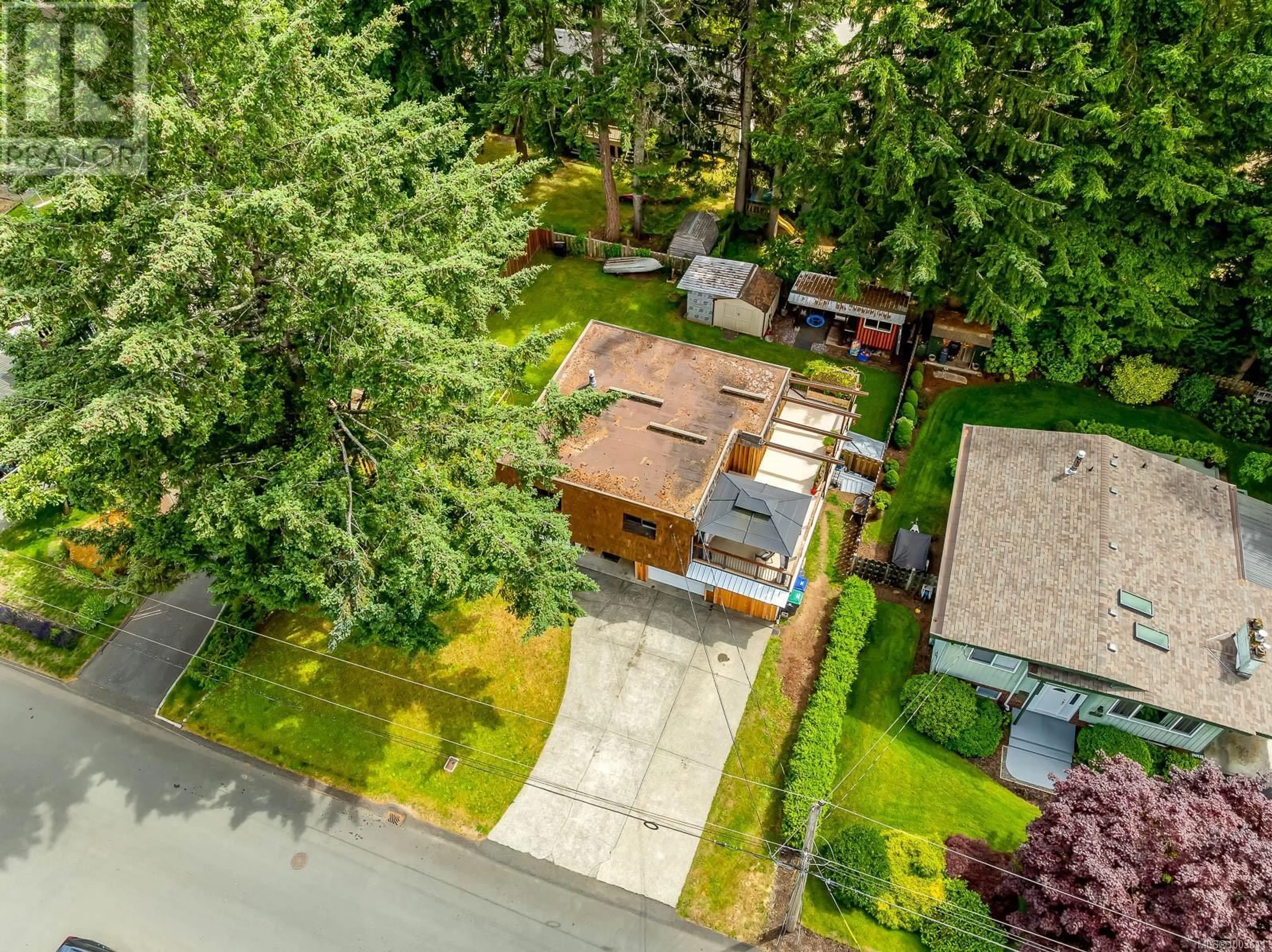 A pic from outside/outdoor area/front of a property/back of a property/a pic from drone, street for 2275 MCKENZIE AVENUE, Comox British Columbia V9M1H9