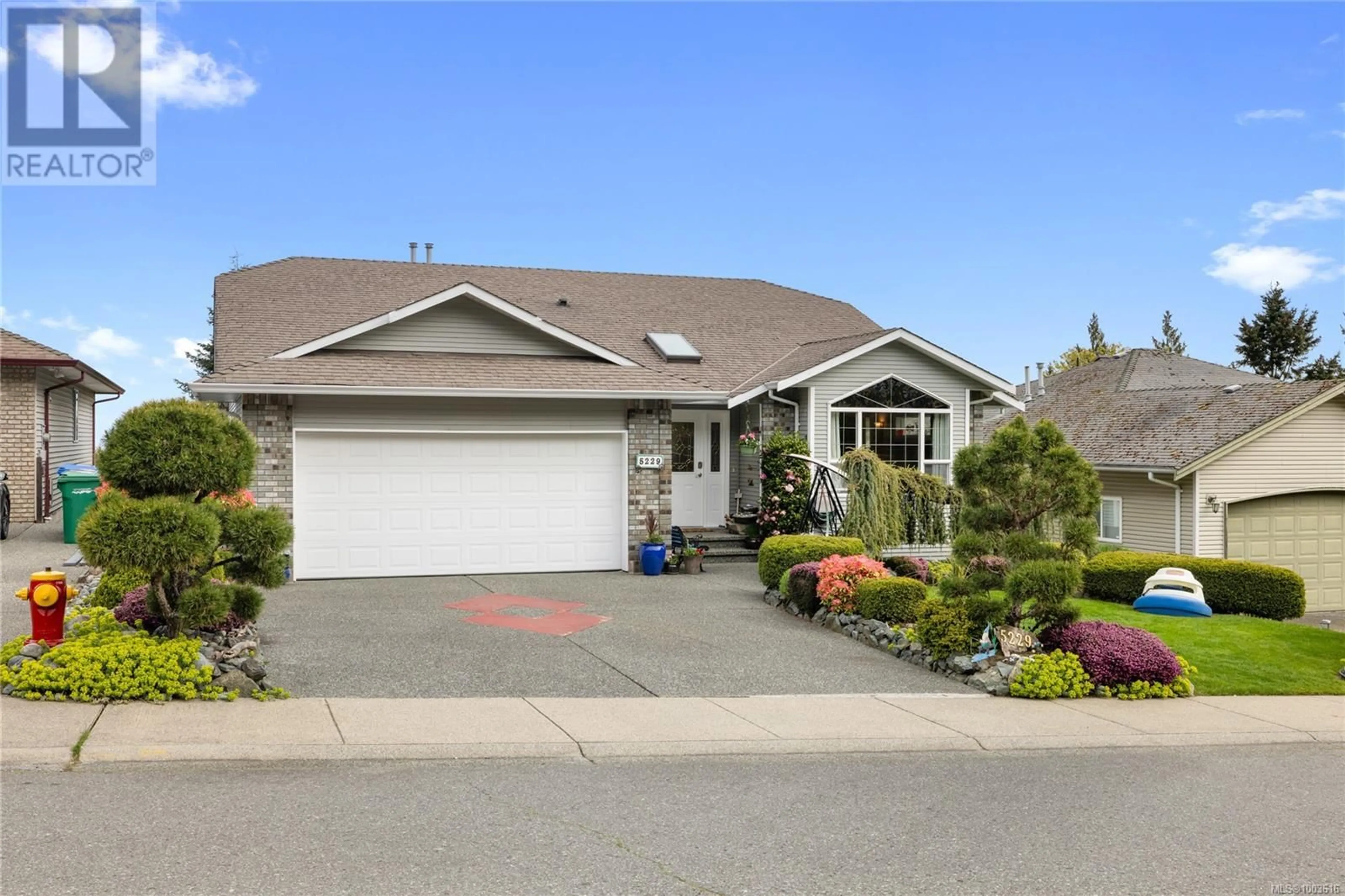 Home with vinyl exterior material, street for 5229 FOX PLACE, Nanaimo British Columbia V9T6K6