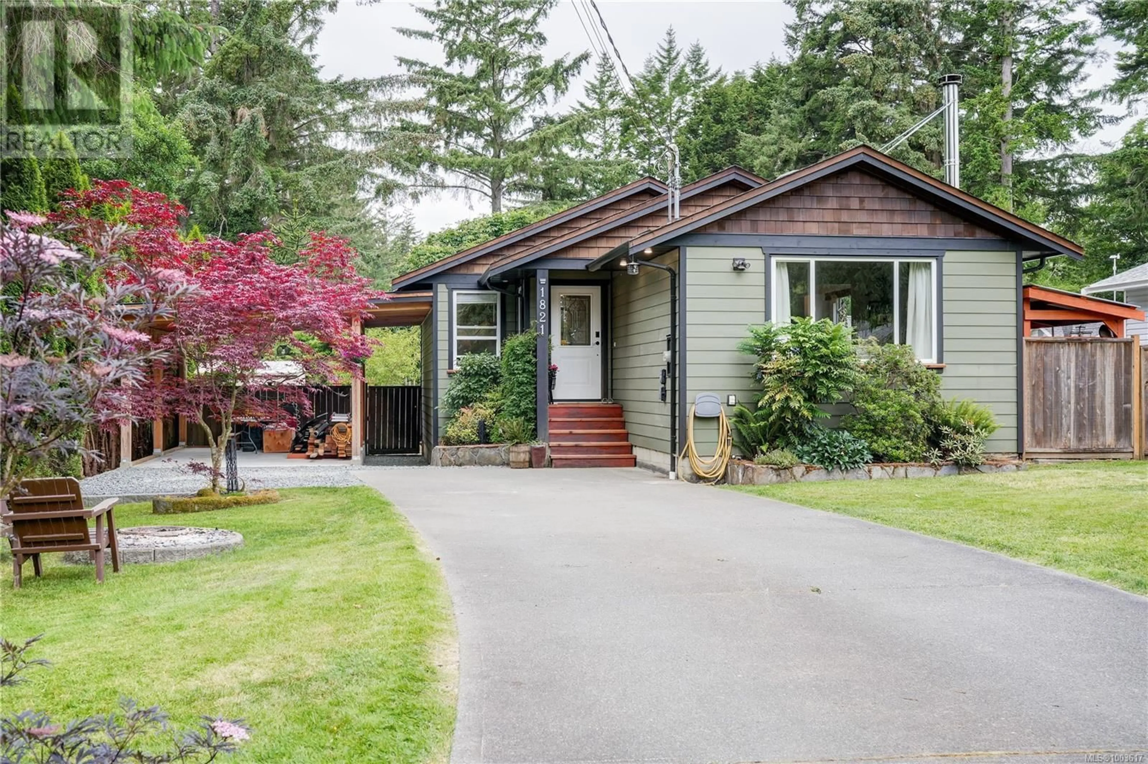 Home with vinyl exterior material, street for 1821 BROOKS ROAD, Sooke British Columbia V9Z0P9