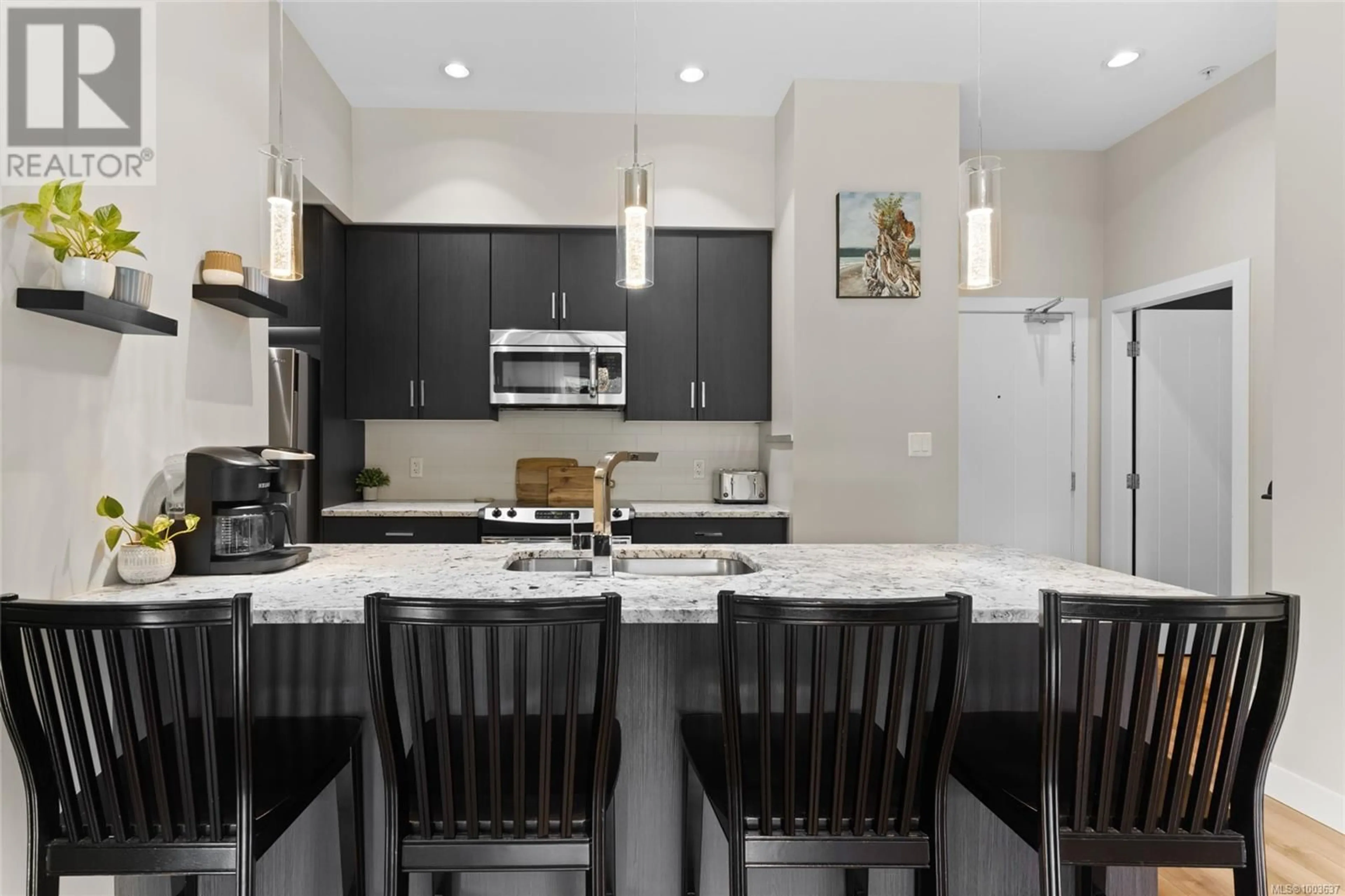 Open concept kitchen, ceramic/tile floor for 417 - 2655 SOOKE ROAD, Langford British Columbia V9B1Y3