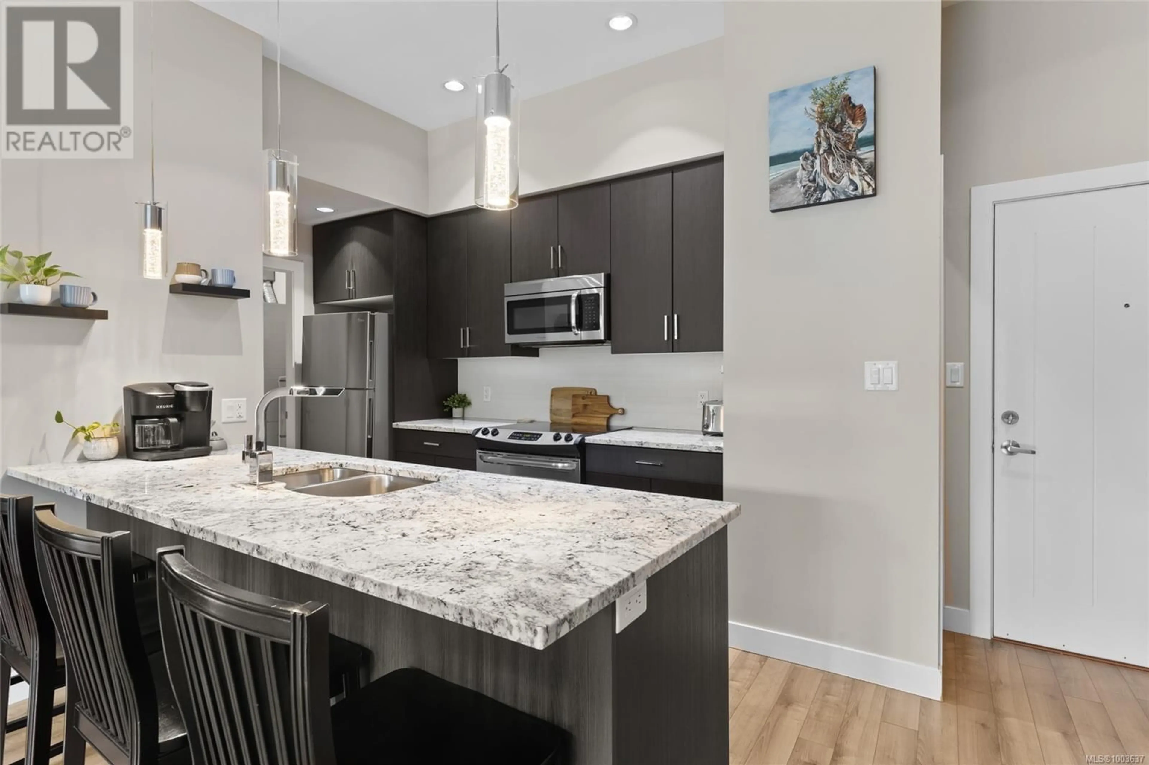Open concept kitchen, unknown for 417 - 2655 SOOKE ROAD, Langford British Columbia V9B1Y3
