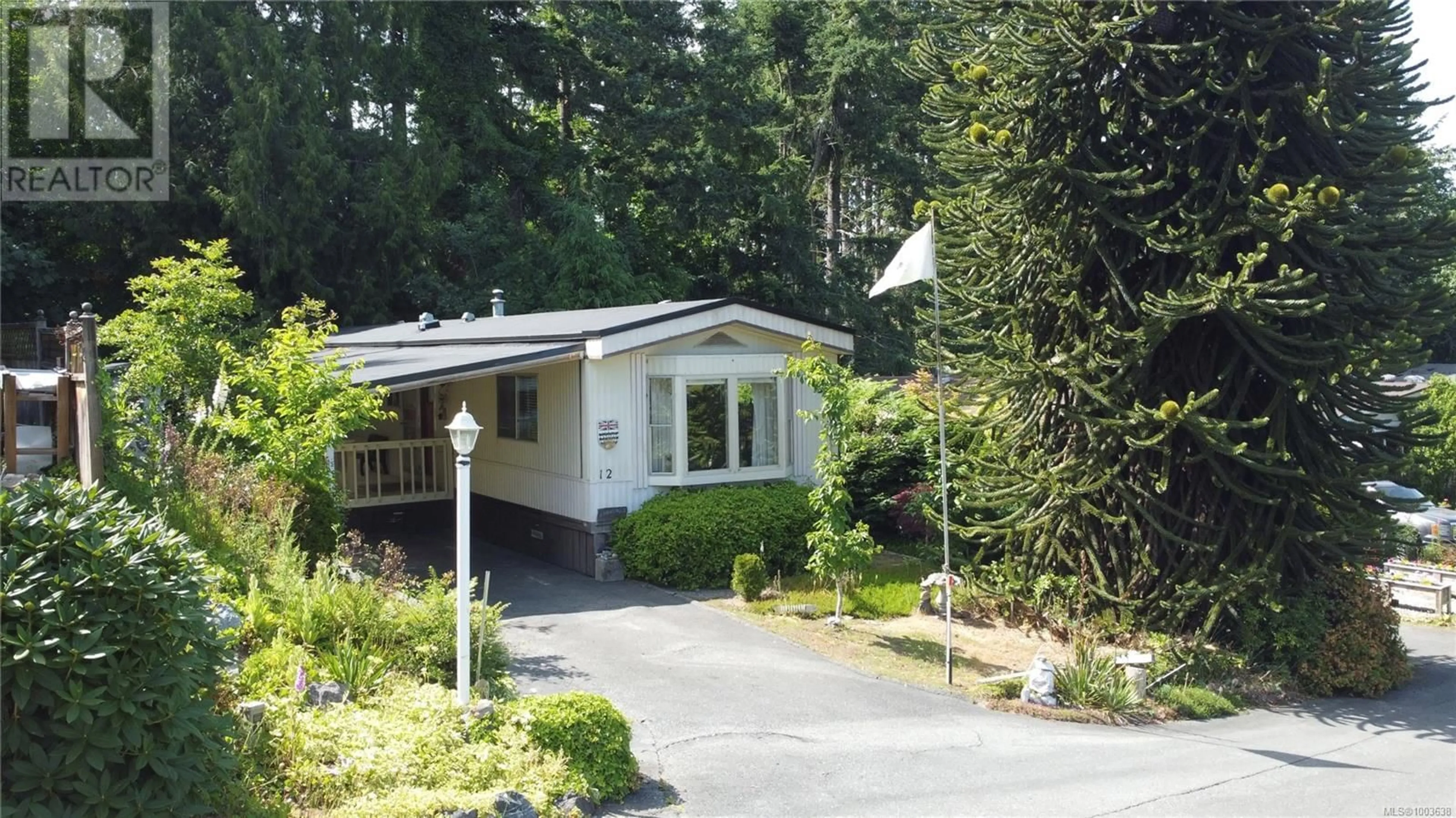 Home with vinyl exterior material, street for 12 - 5150 CHRISTIE ROAD, Ladysmith British Columbia V9G1J2