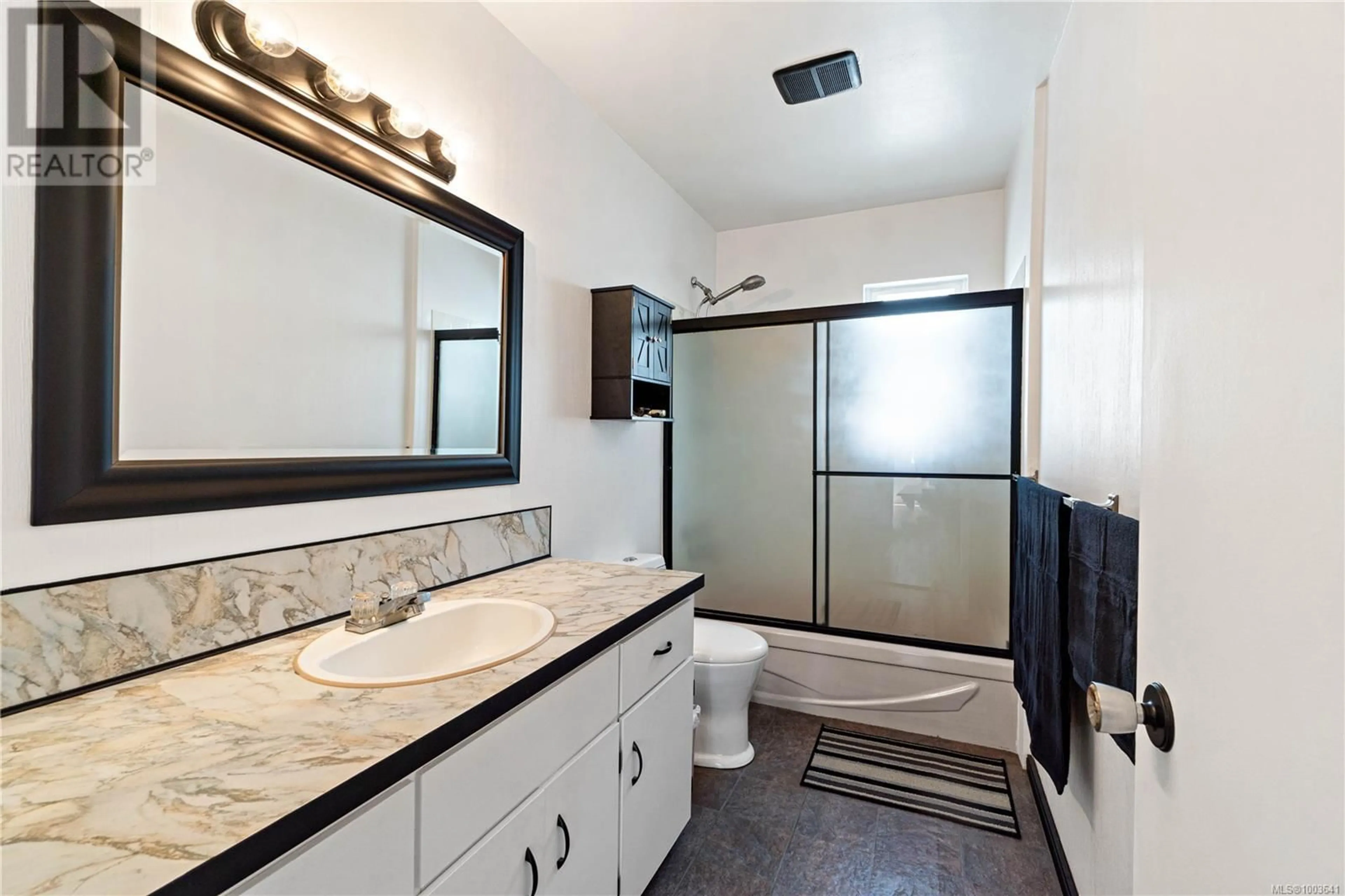Standard bathroom, ceramic/tile floor for 125 HAREWOOD ROAD, Nanaimo British Columbia V9R2Y7