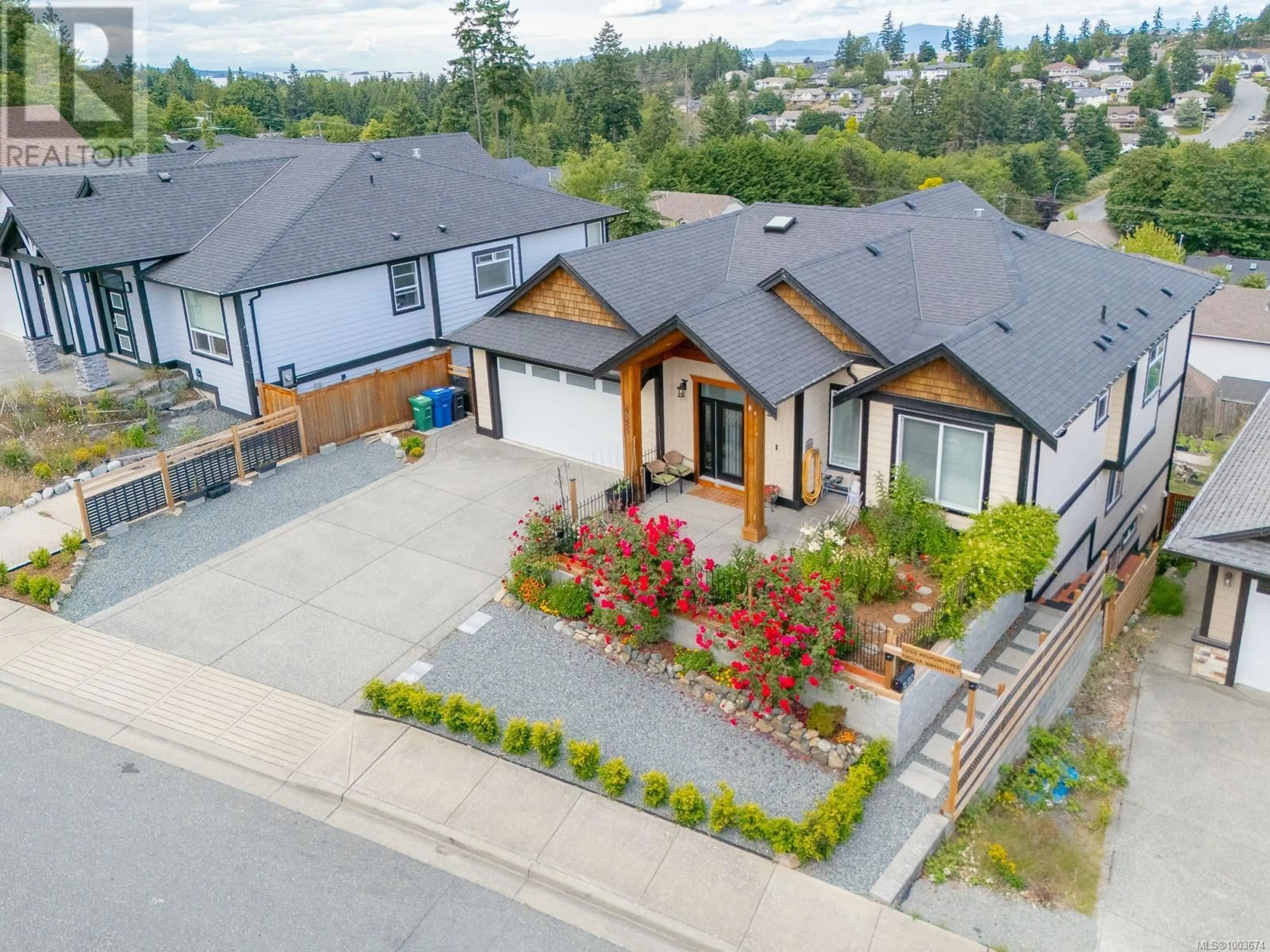 A pic from outside/outdoor area/front of a property/back of a property/a pic from drone, street for 4626 SHERIDAN RIDGE ROAD, Nanaimo British Columbia V9T6S6