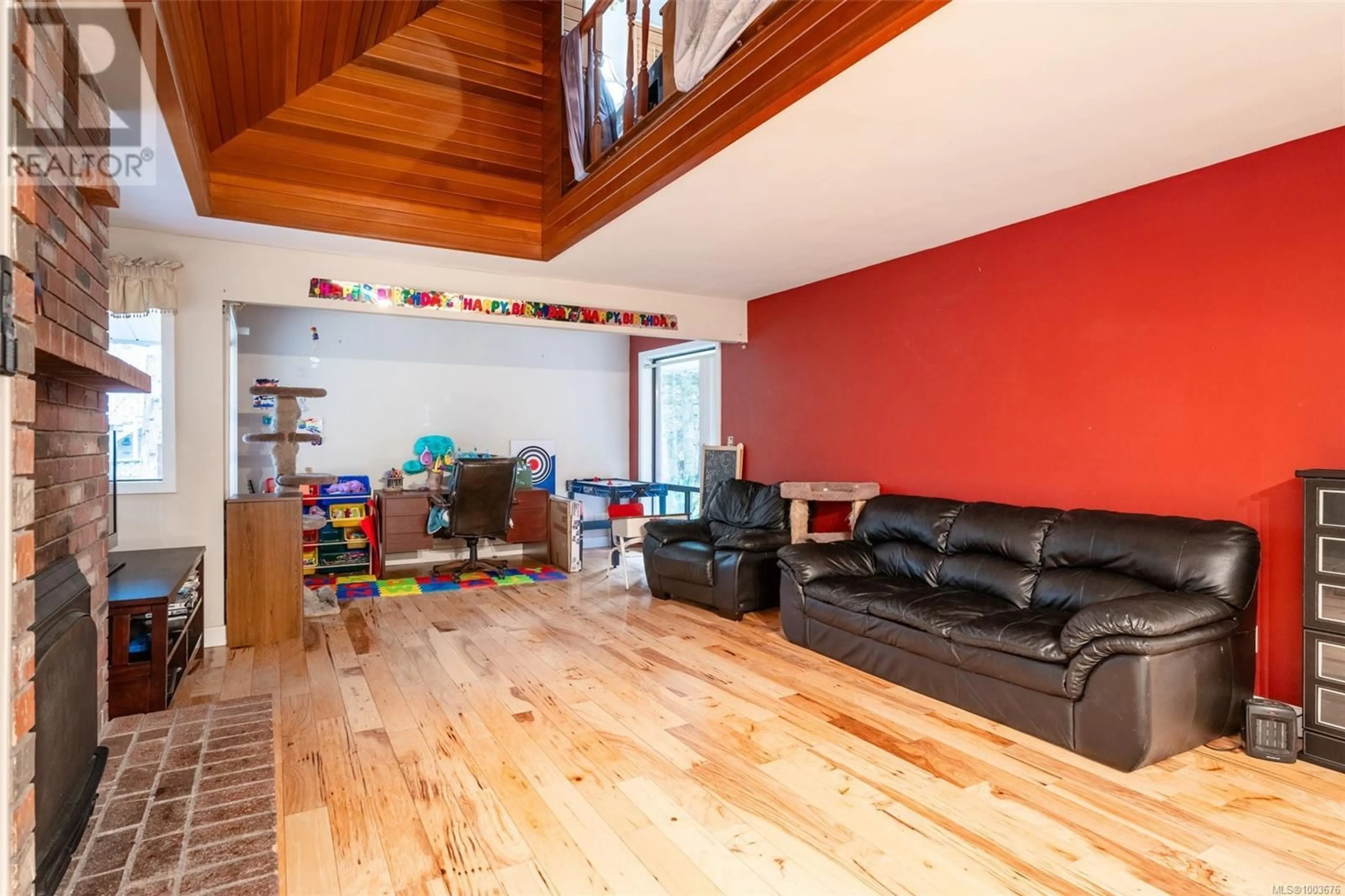 Living room with furniture, wood/laminate floor for 3074 SOOKE ROAD, Langford British Columbia V9B5Y9