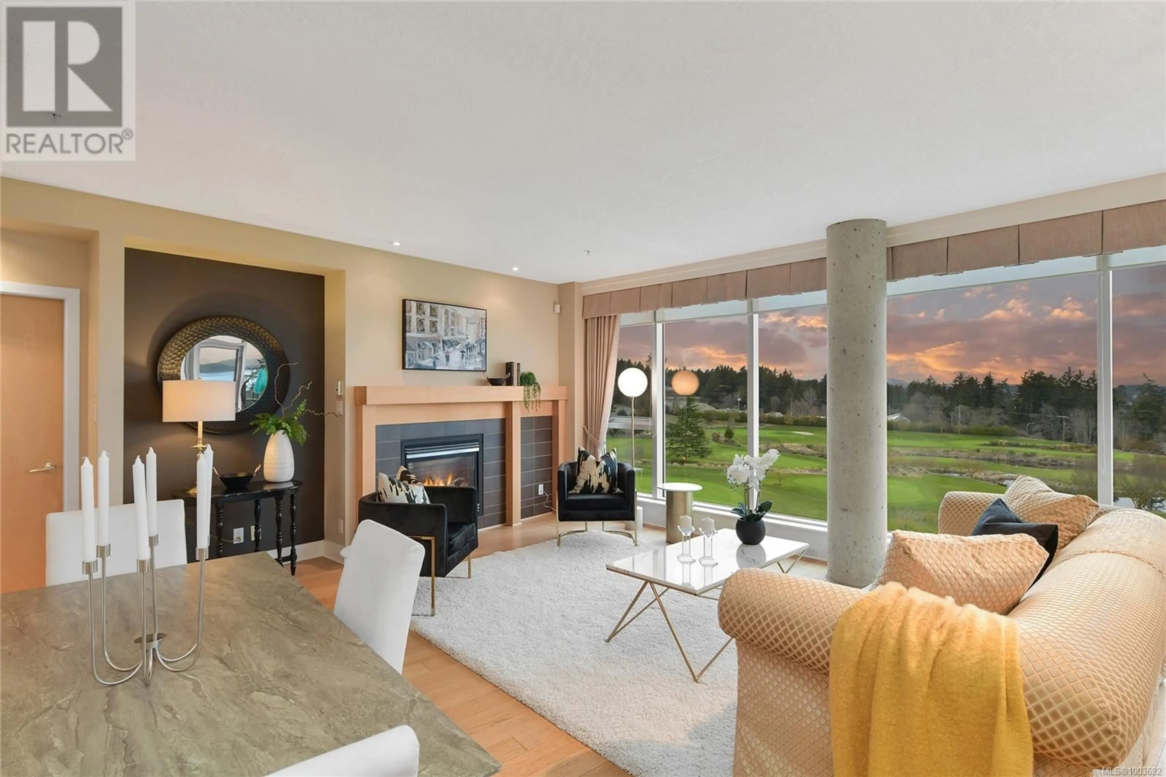 Living room with furniture, unknown for 505 - 5332 SAYWARD HILL CRESCENT, Saanich British Columbia V8Y3H8
