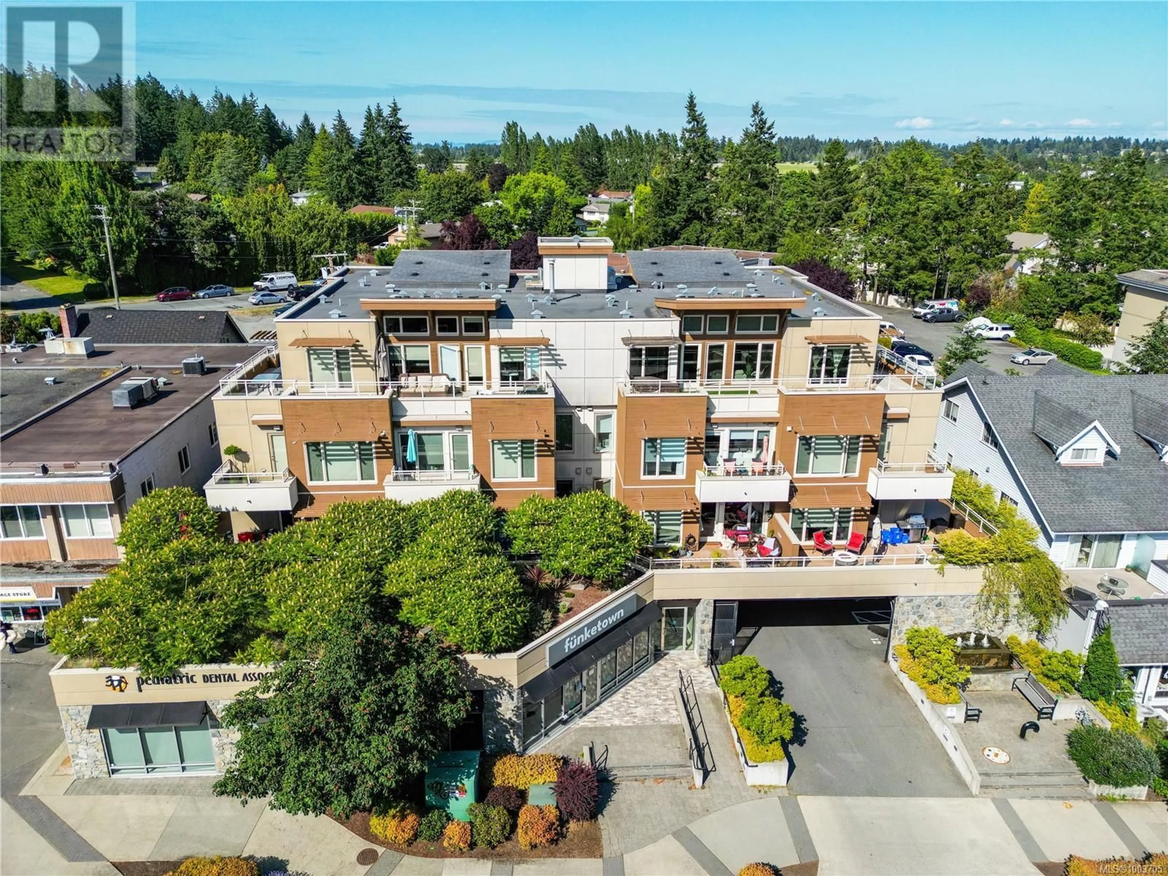A pic from outside/outdoor area/front of a property/back of a property/a pic from drone, unknown for 302 - 7161 WEST SAANICH ROAD, Central Saanich British Columbia V8M1P7